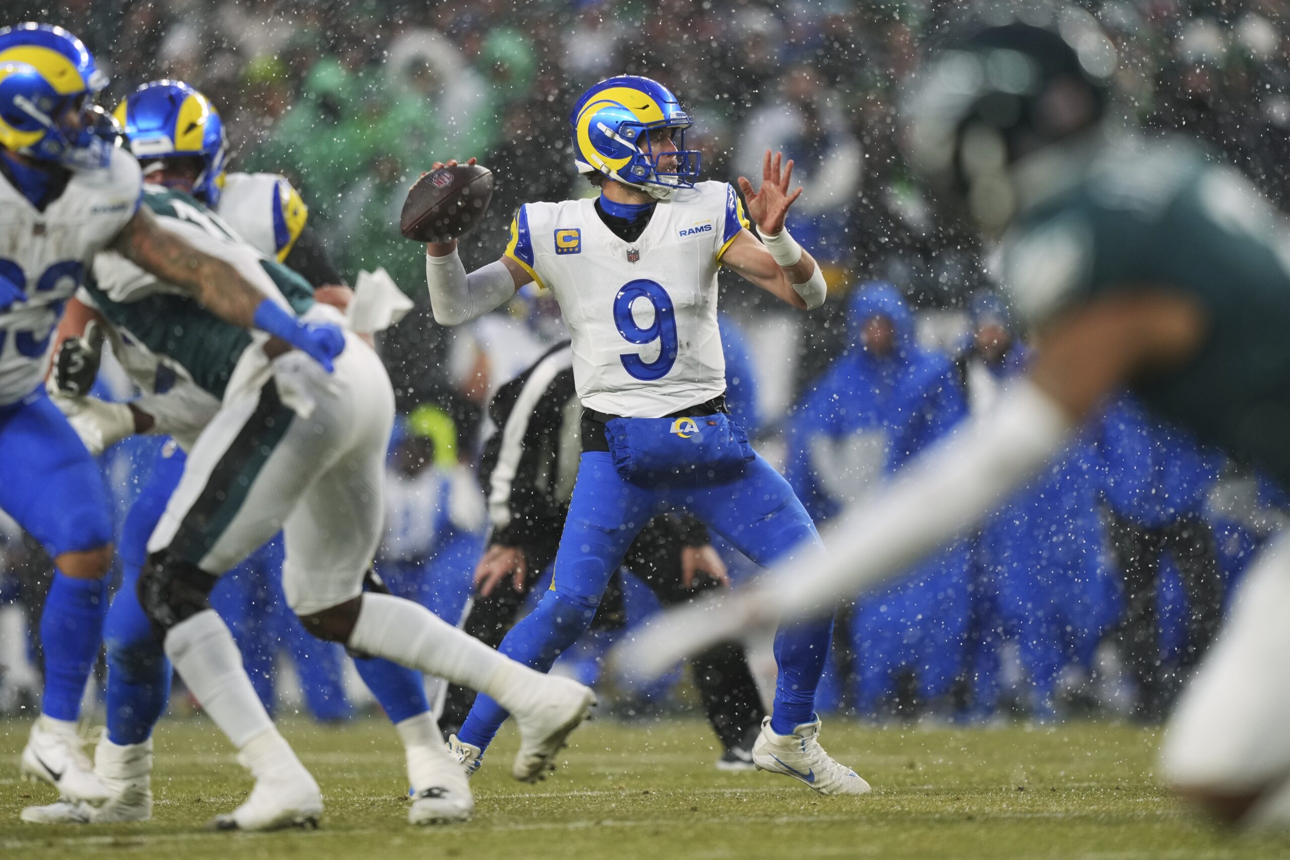 Los Angeles Rams quarterback Matthew Stafford (9) looks to pass...