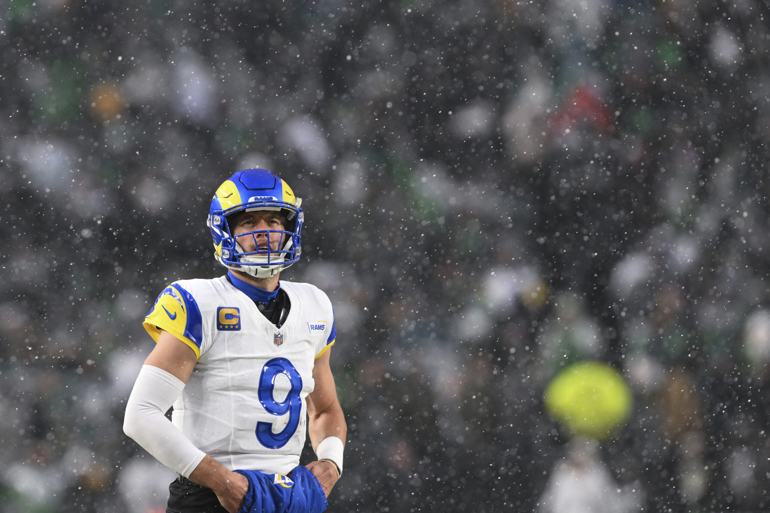 Los Angeles Rams quarterback Matthew Stafford (9) looks on between...