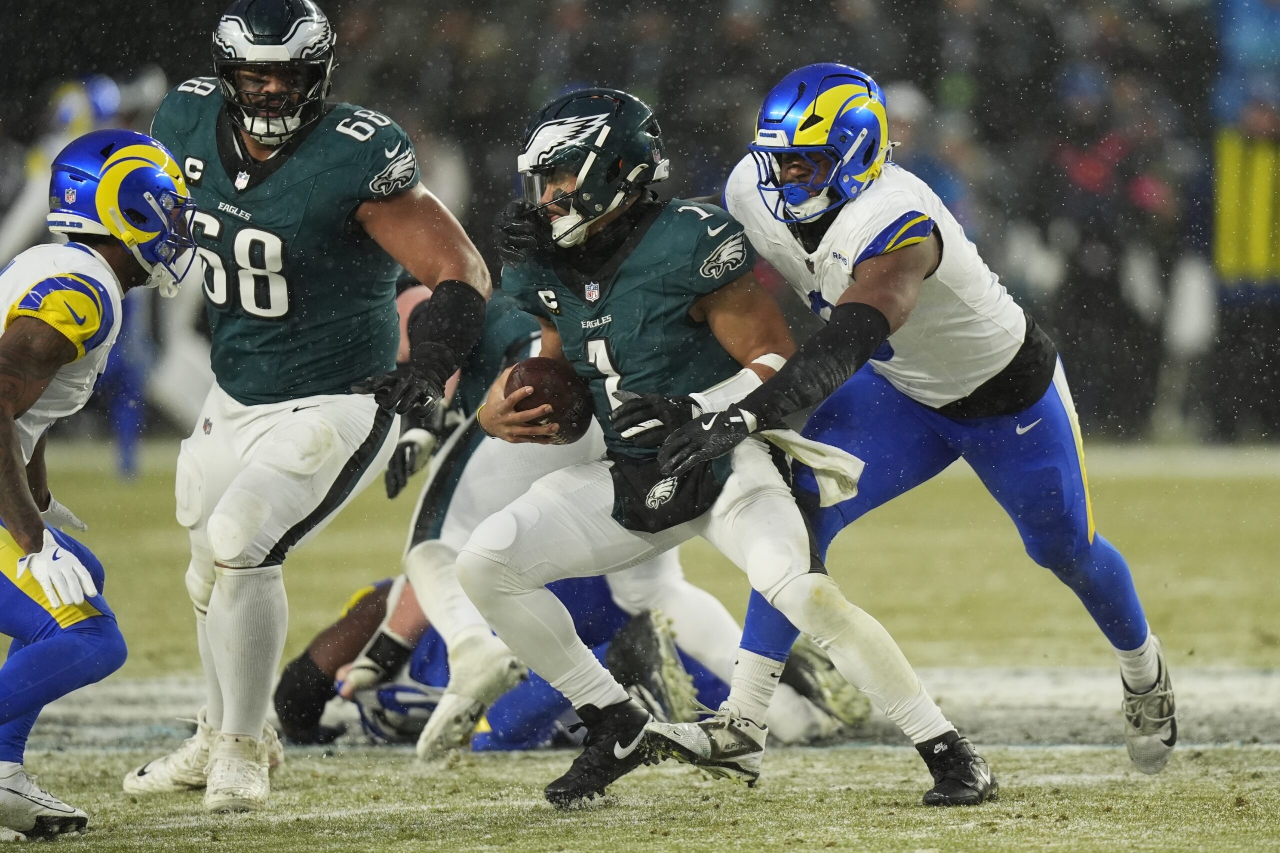 Los Angeles Rams linebacker Jared Verse (8) sacks Philadelphia Eagles...