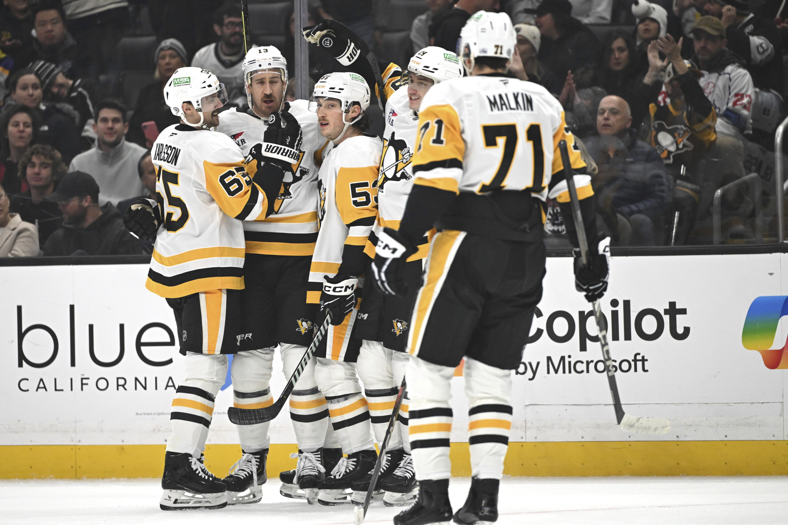 Pittsburgh Penguins right wing Kevin Hayes (13) is congratulated by...