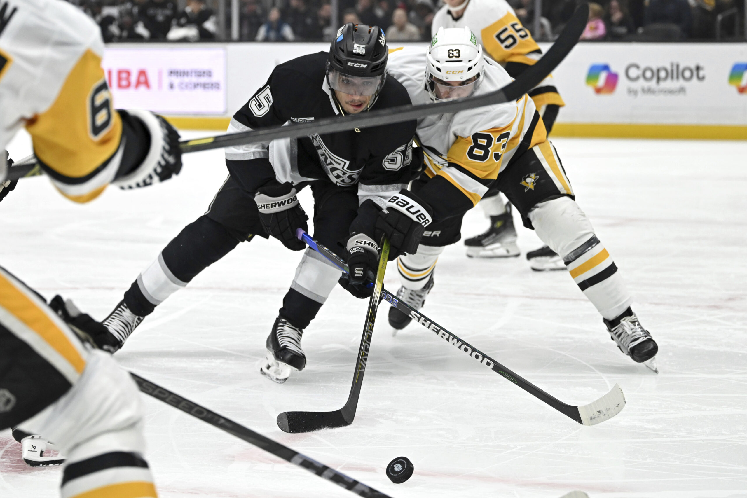 Kings right wing Quinton Byfield, left, and Pittsburgh Penguins left...