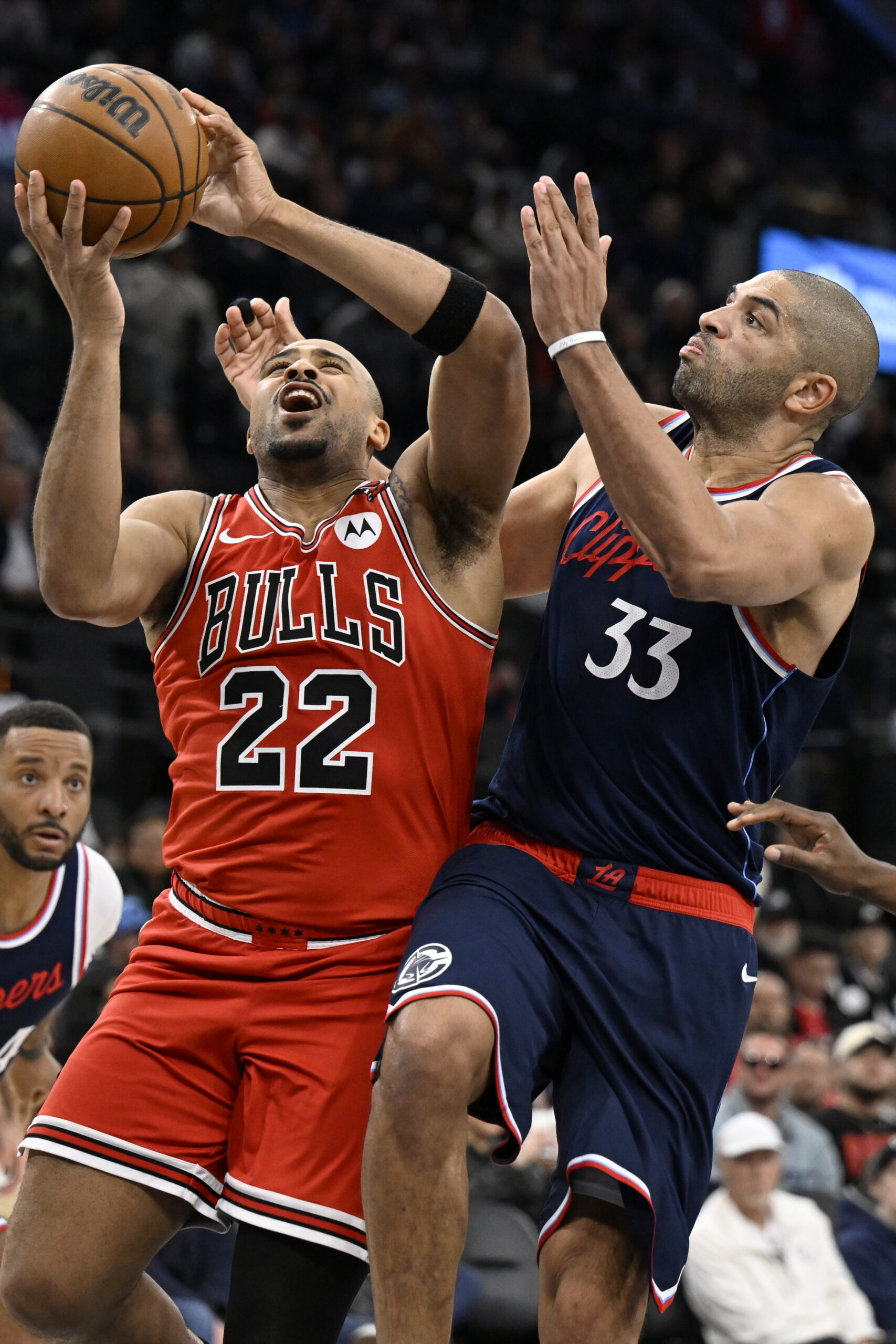 Chicago Bulls forward Talen Horton-Tucker (22) shoots as Clippers forward...