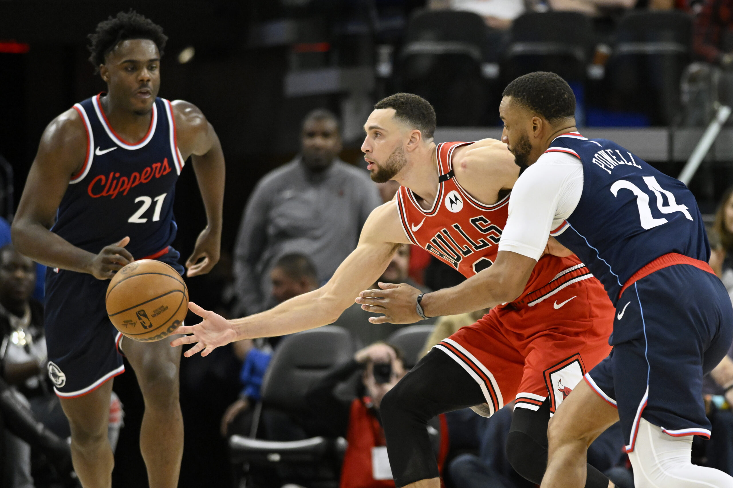 Chicago Bulls guard Zach LaVine (8) passes the ball between...