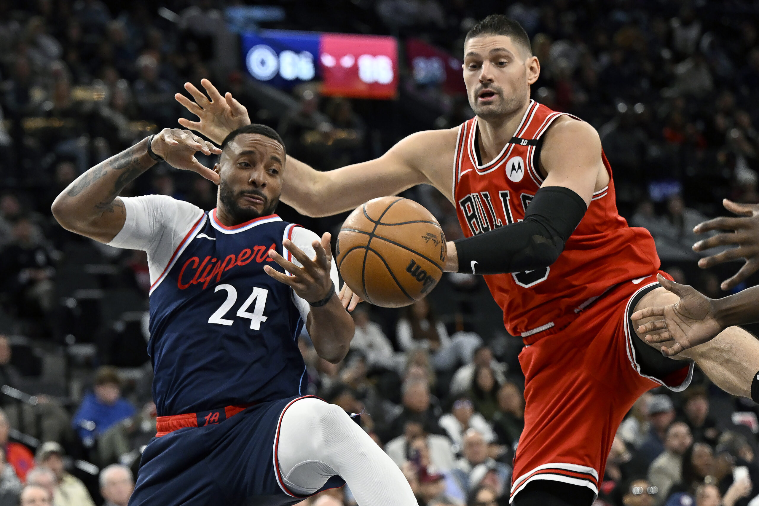 Clippers guard Norman Powell (24) vies for the ball with...