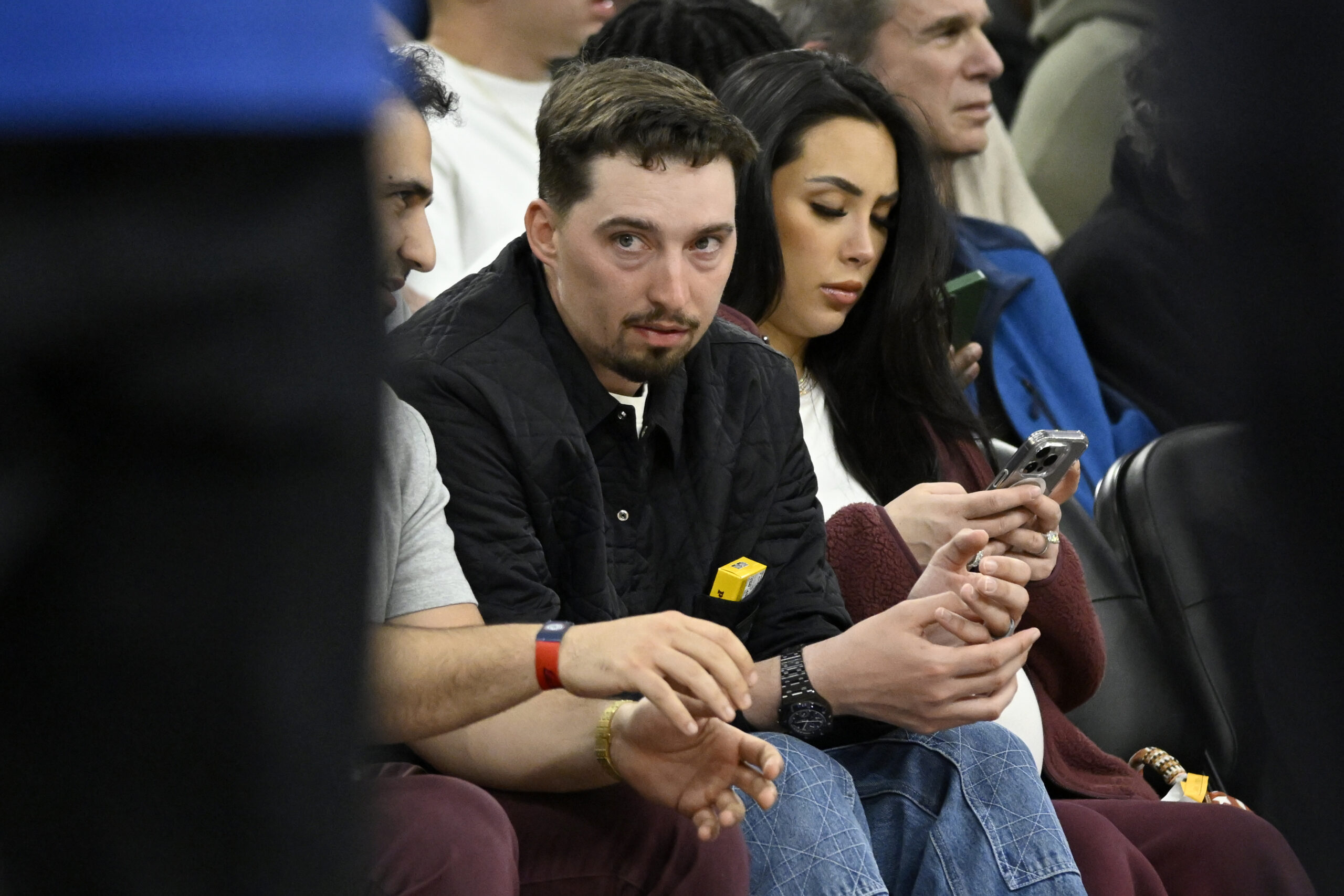 Recently signed by Dodgers pitcher Blake Snell, center, attends an...