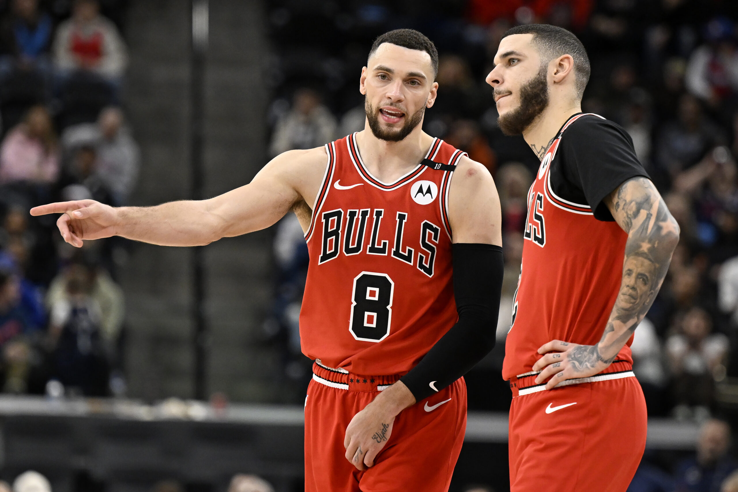 Chicago Bulls guard Zach LaVine (8) chats with guard Lonzo...