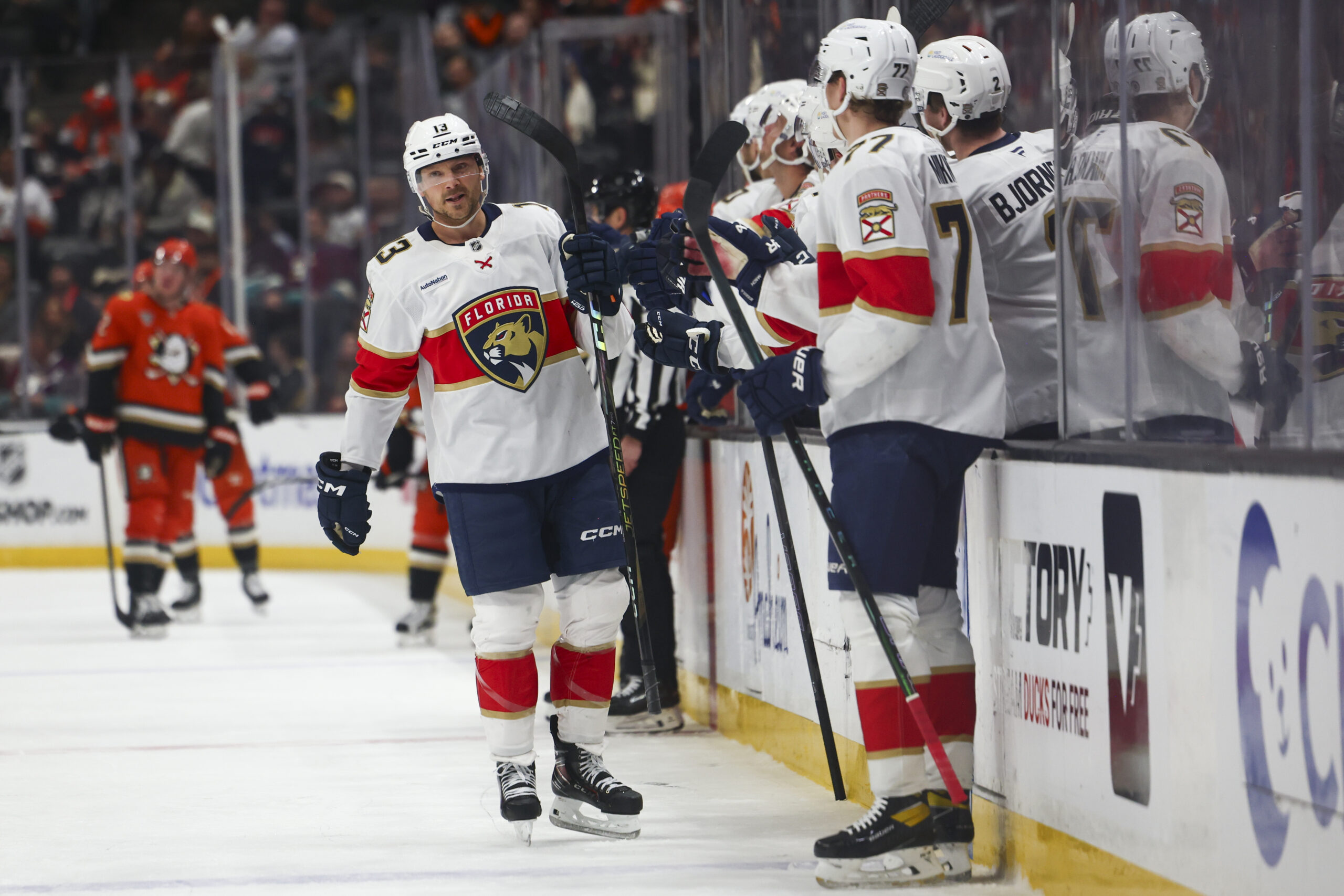 Florida Panthers center Sam Reinhart (13) celebrates with defenseman Niko...