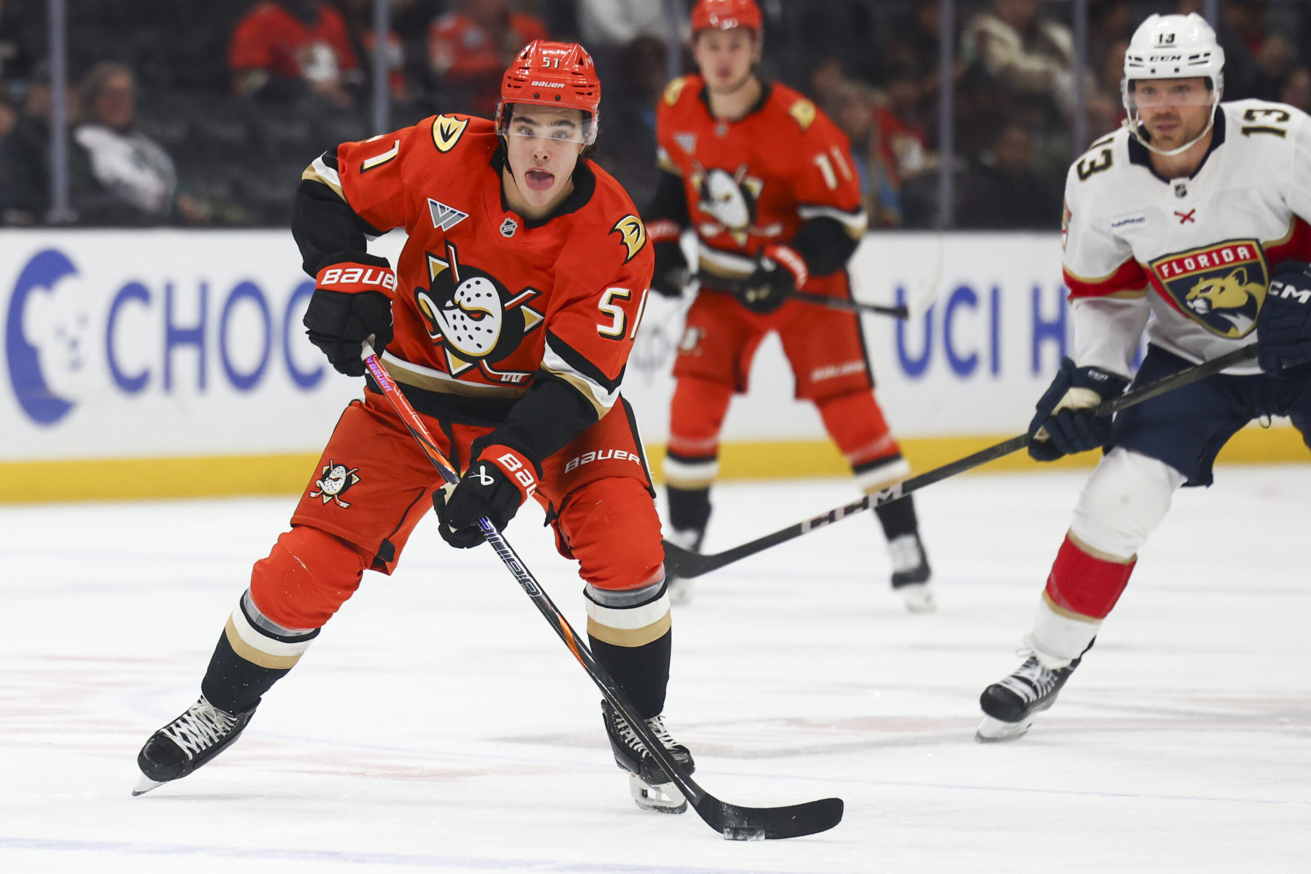 Ducks defenseman Olen Zellweger (51) skates with the puck as...