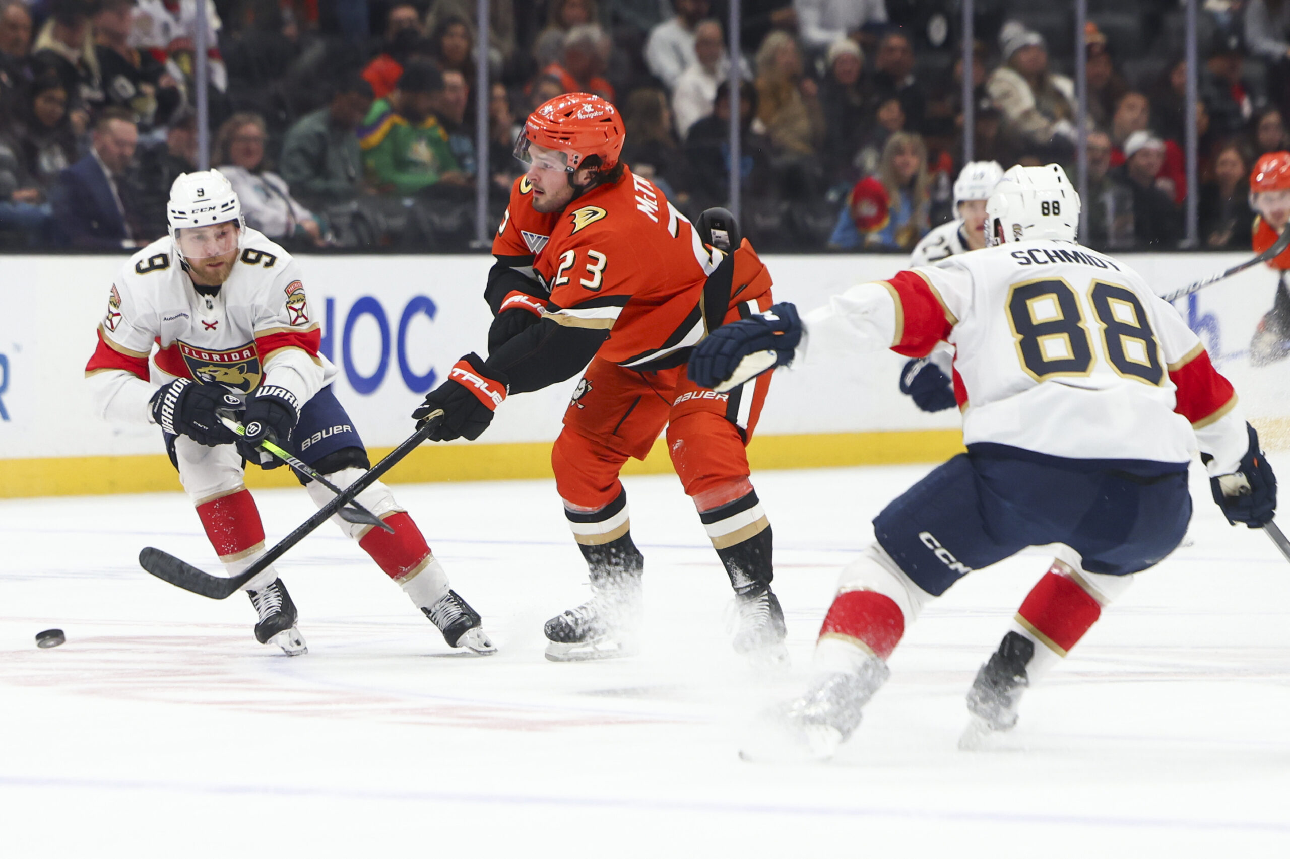 Ducks center Mason McTavish (23) passes the puck against Florida...