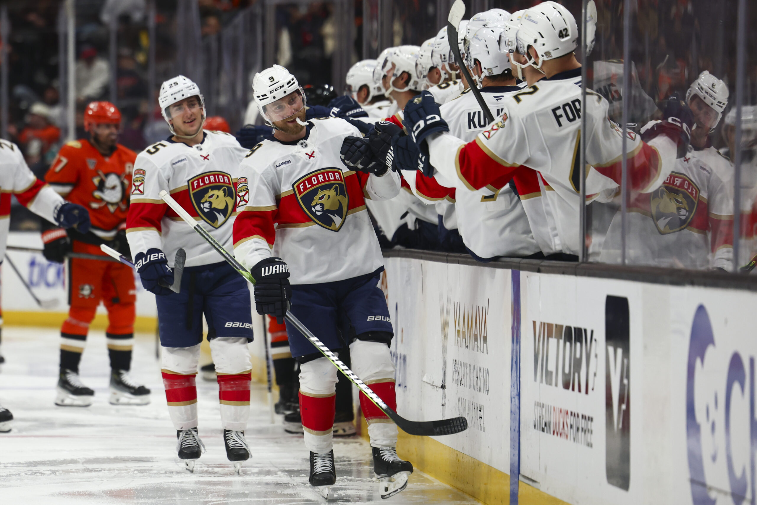 Florida Panthers center Sam Bennett celebrates with his teammates after...