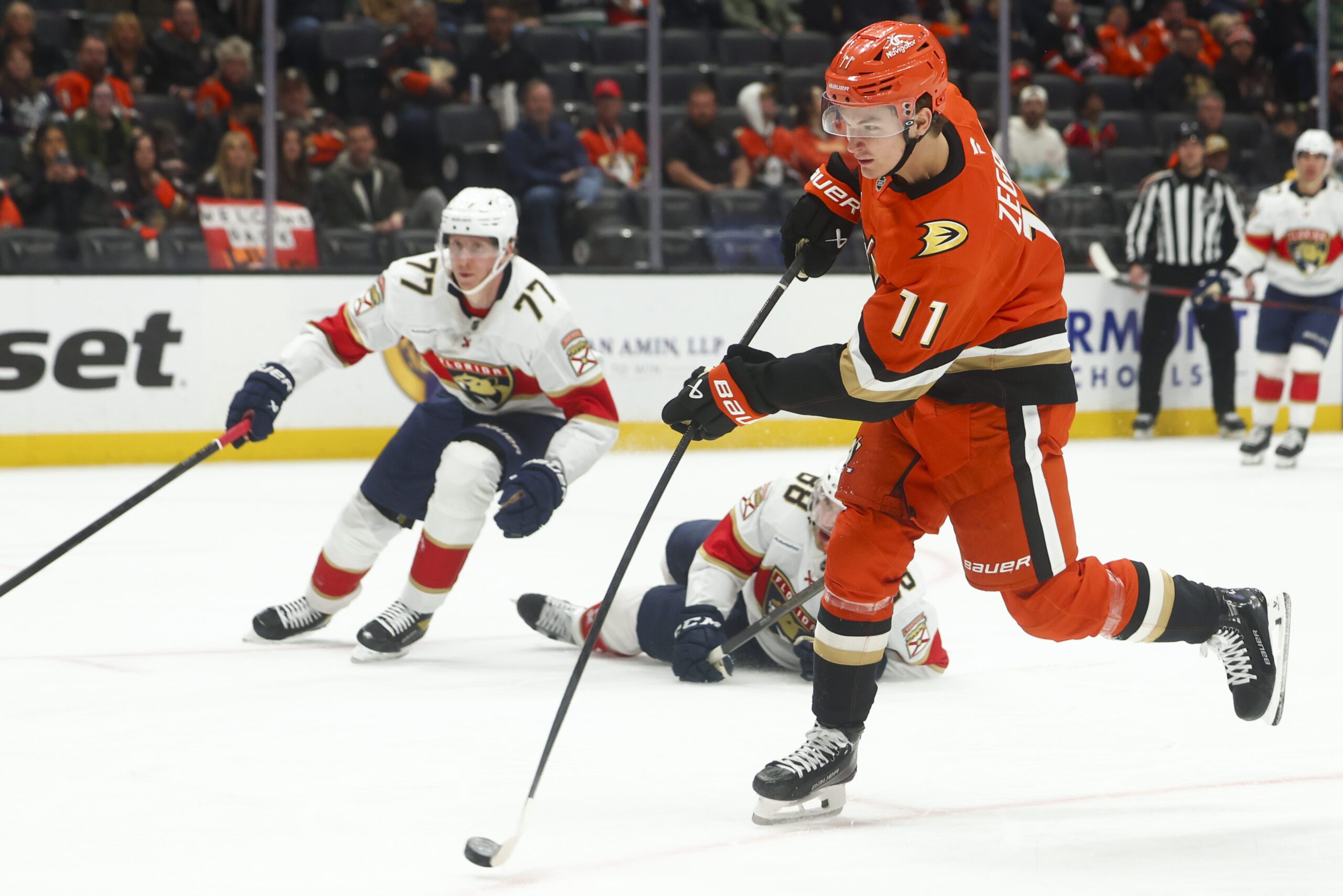 Ducks forward Trevor Zegras shoots the puck as Florida Panthers...