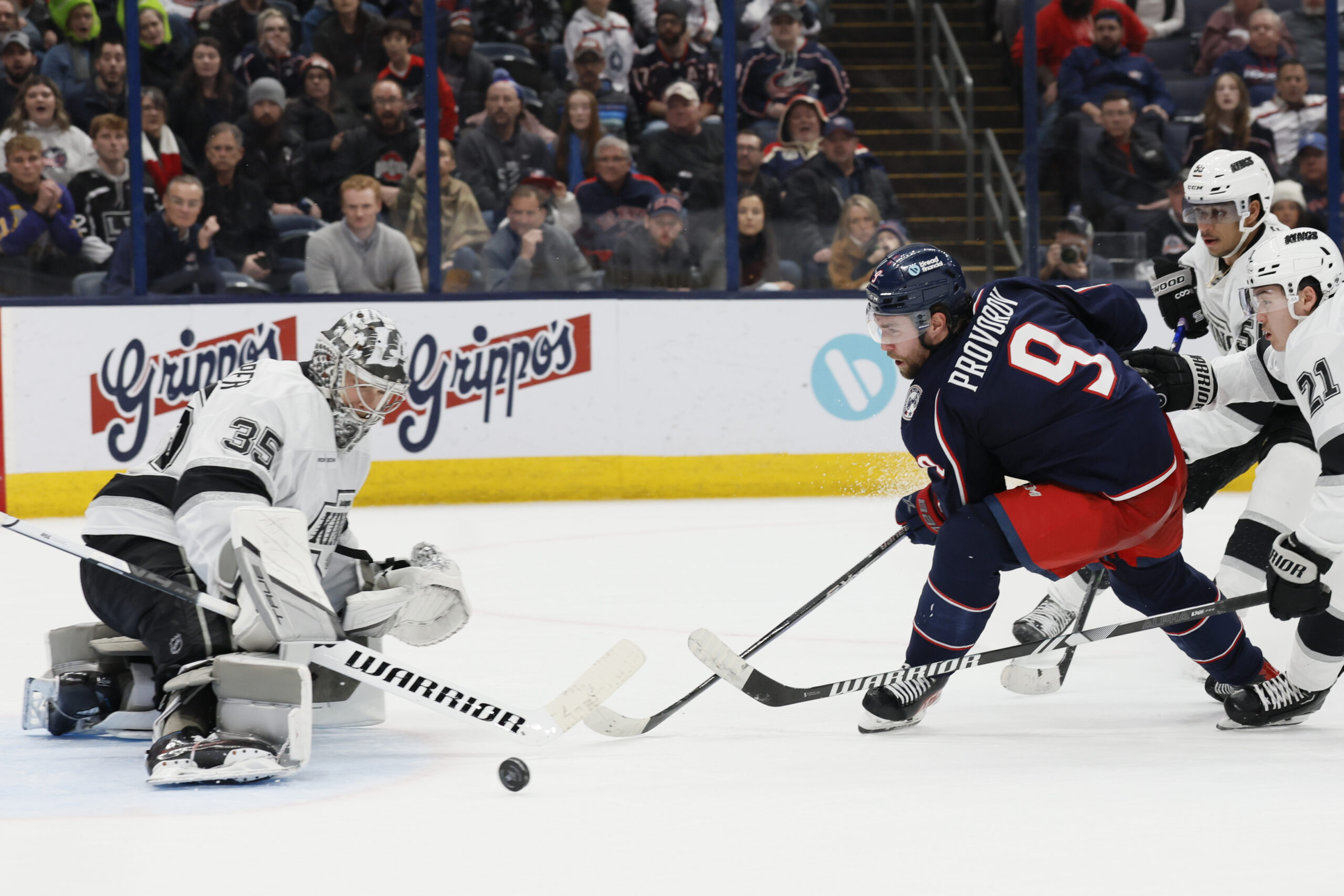 Columbus Blue Jackets’ Ivan Provorov (9) shoots against Kings’ Darcy...