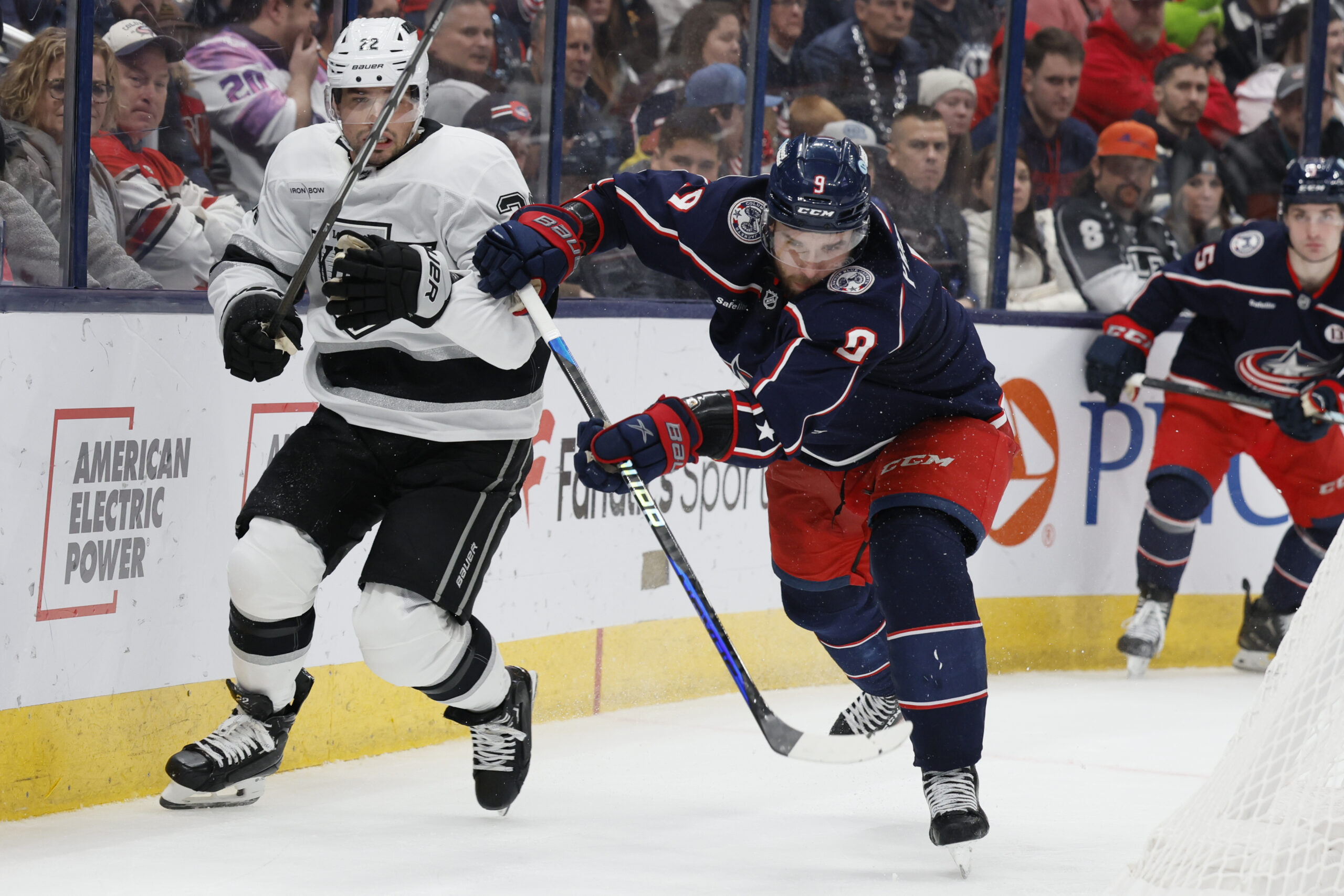 Kings’ Kevin Fiala, left, and Columbus Blue Jackets’ Ivan Provorov...