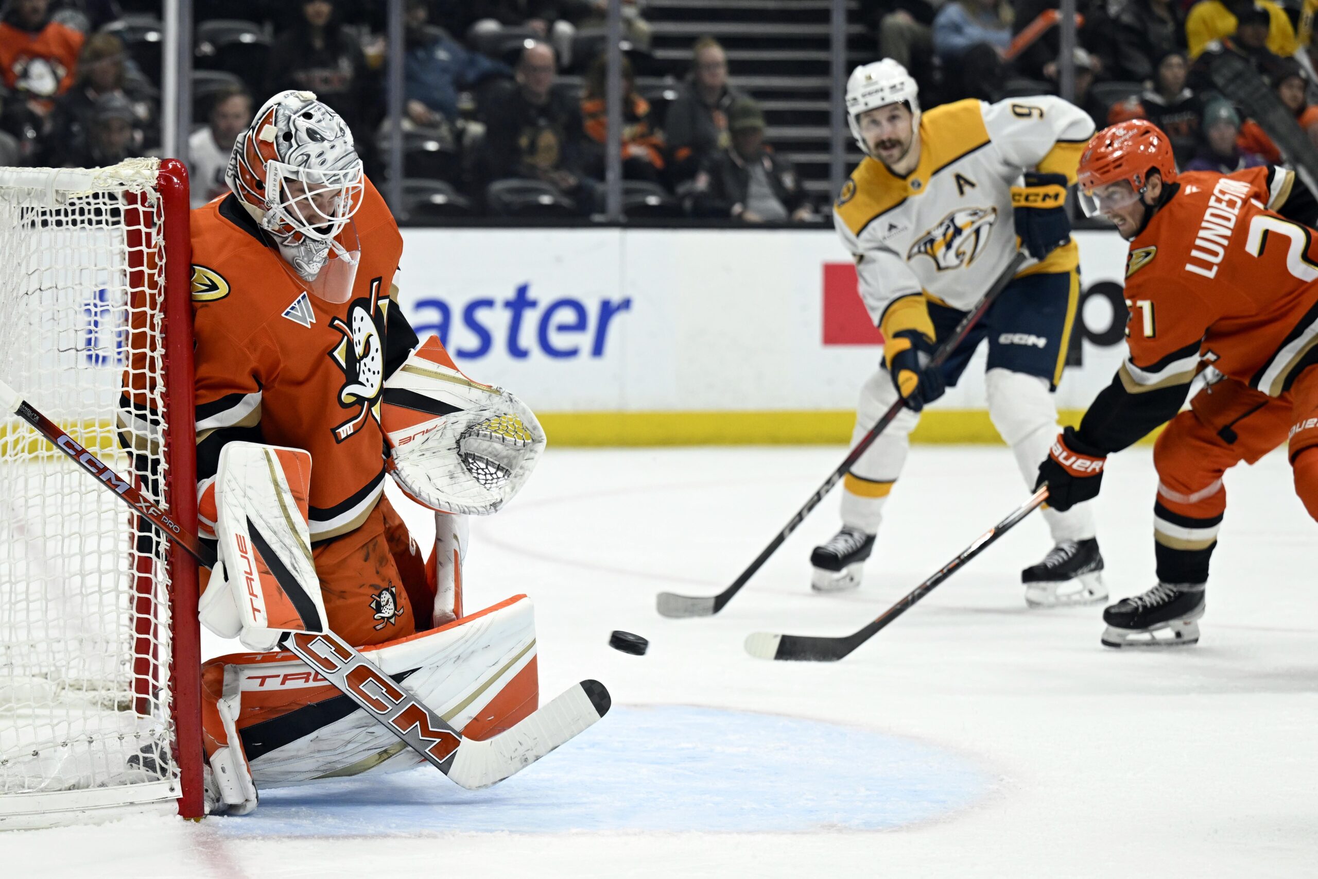 Ducks goaltender Lukas Dostal (1) stops a shot by Nashville...