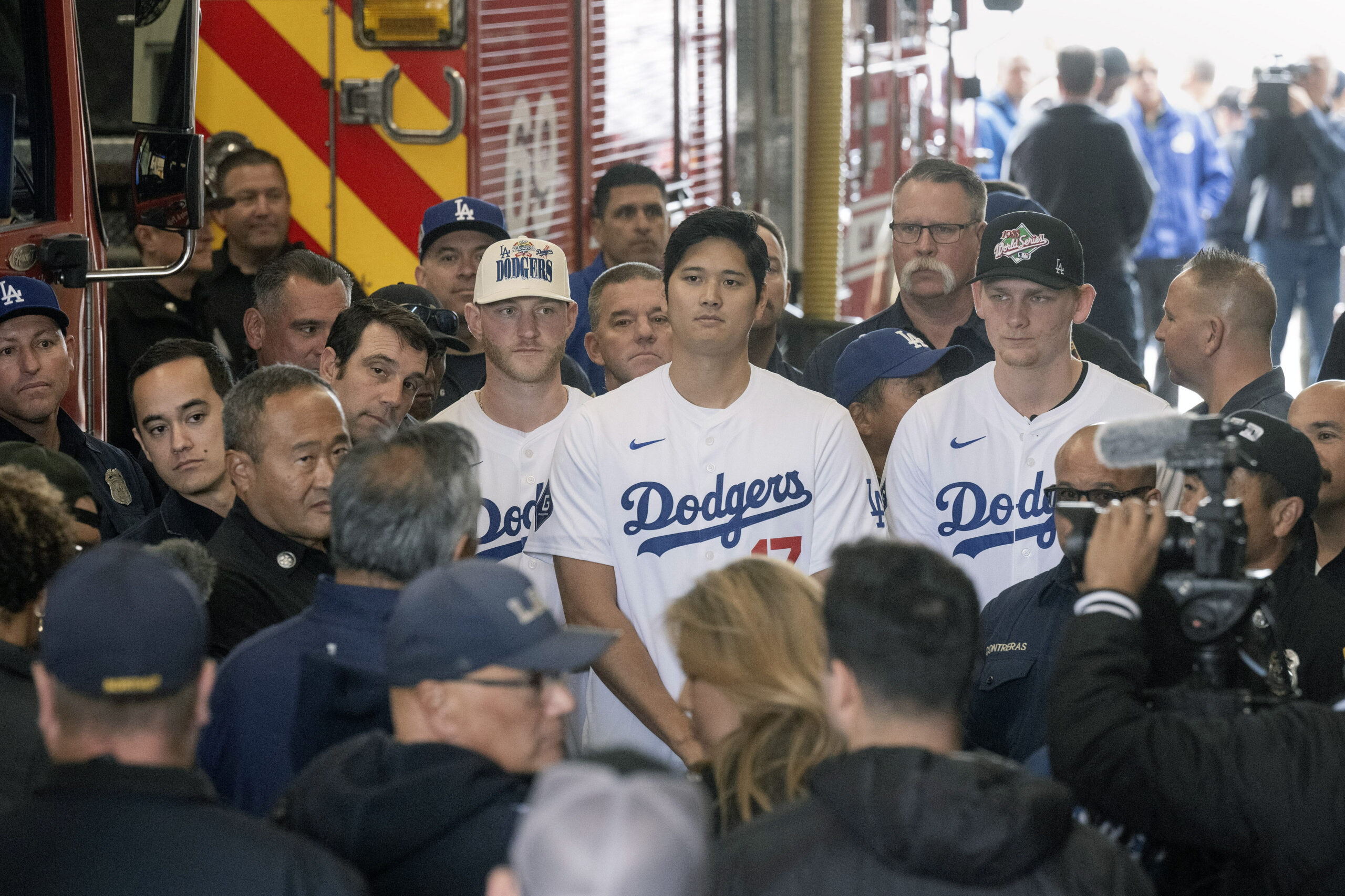 From left, Dodgers players Ben Casparius, Shohei Ohtani and Emmet...