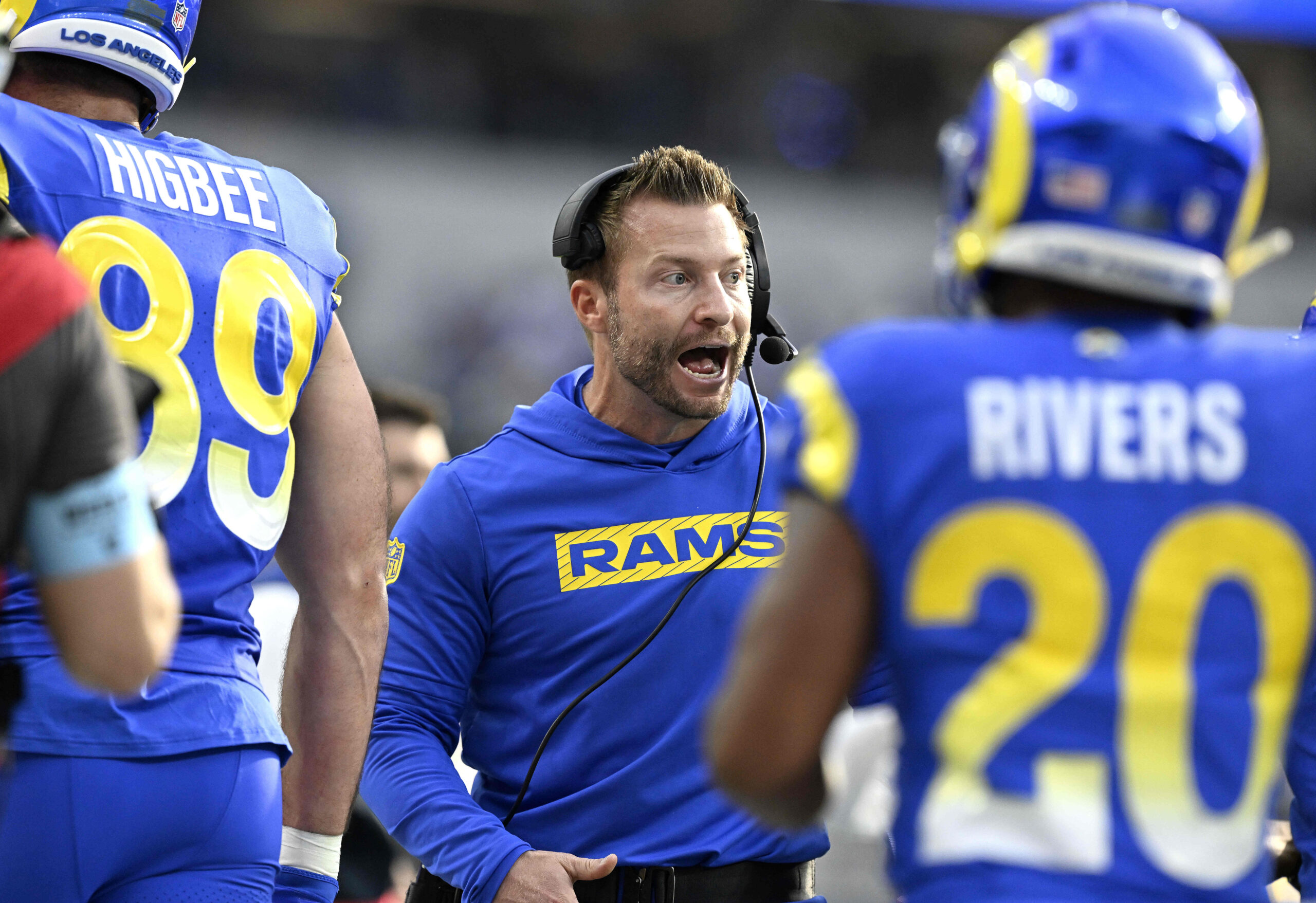 Rams head coach Sean McVay congratulates players following a second...