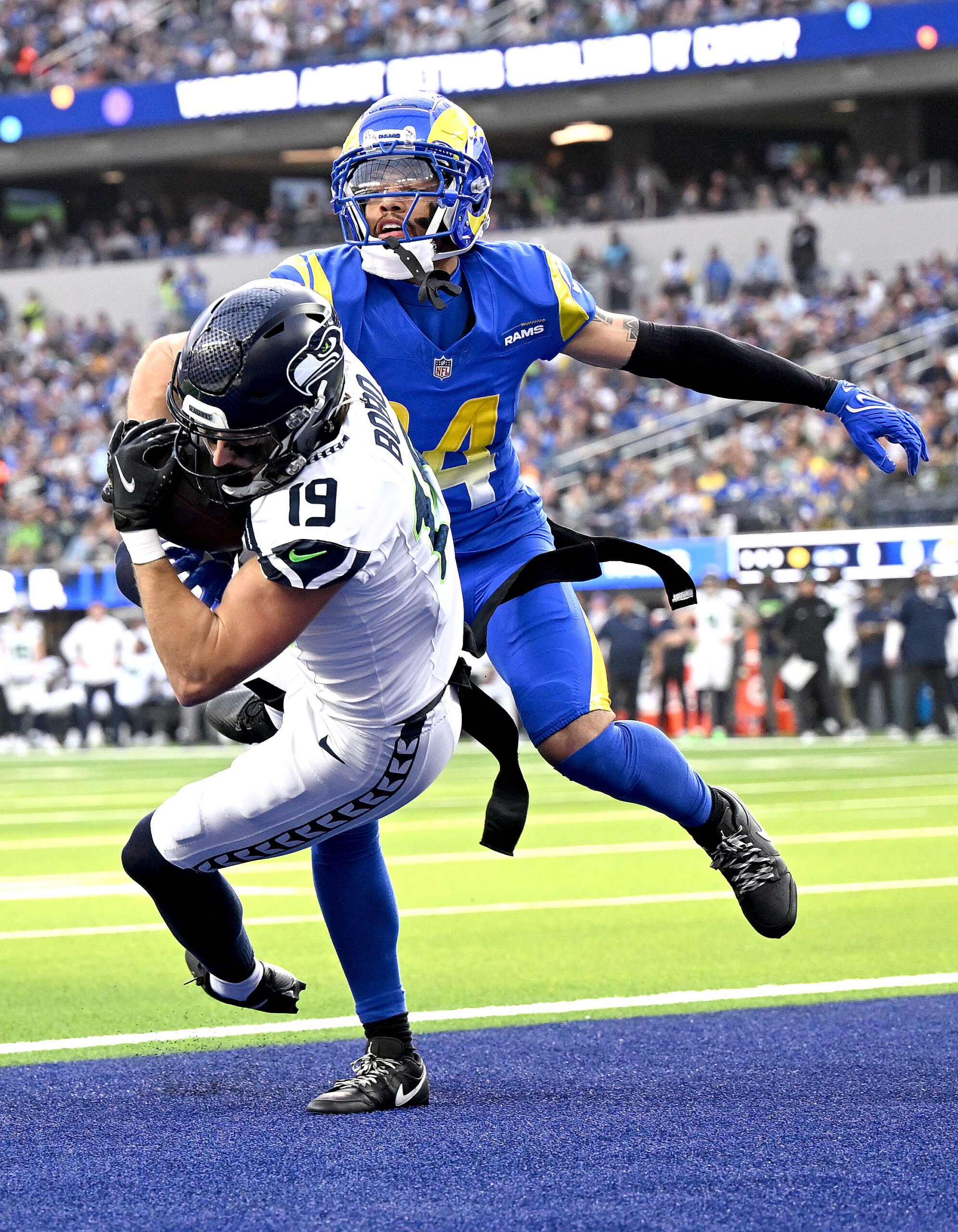 Seattle’s Jake Bobo catches a first quarter touchdown as the...