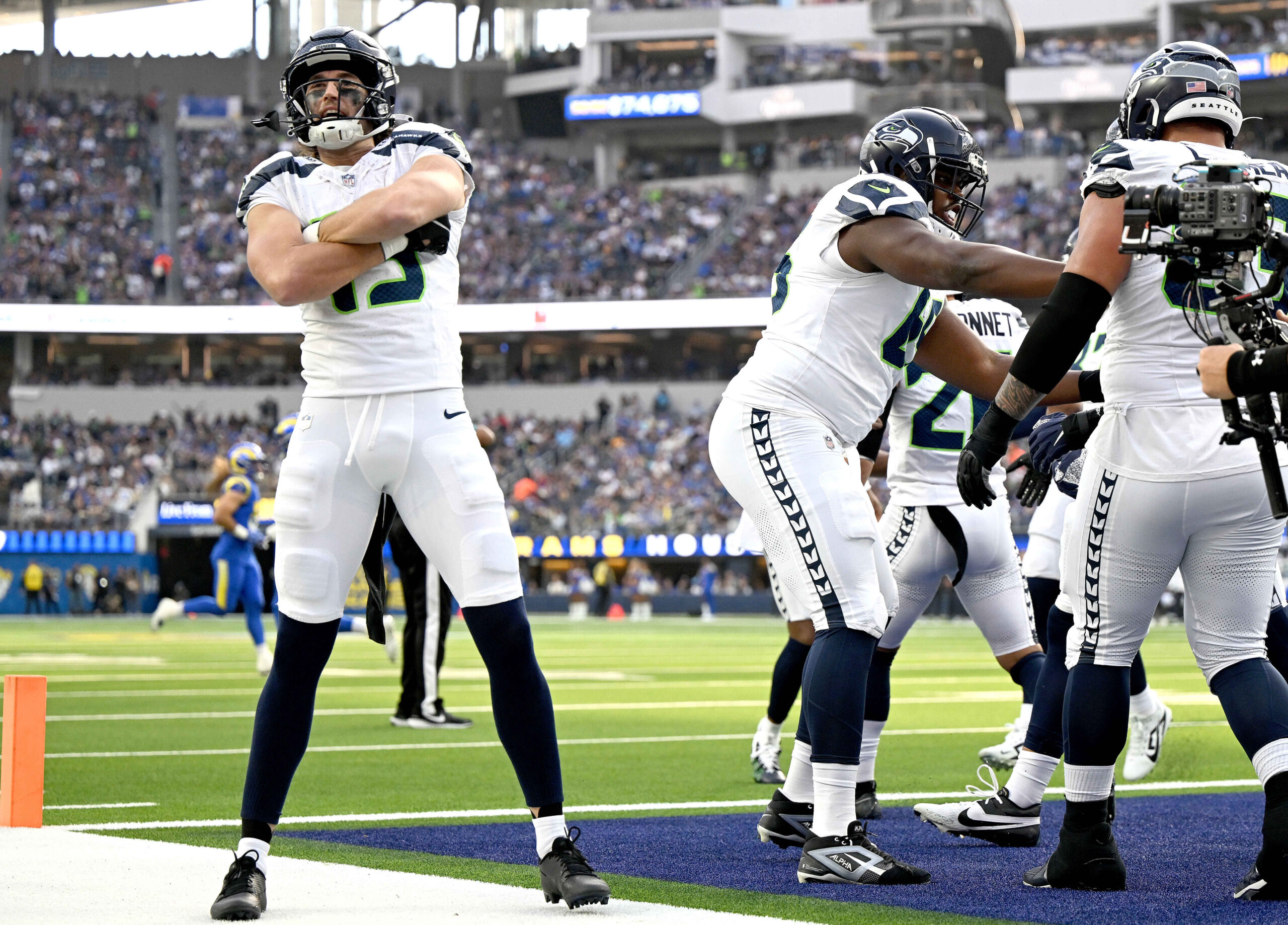 Seattle’s Jake Bobo (left) reacts after scoring a first quarter...