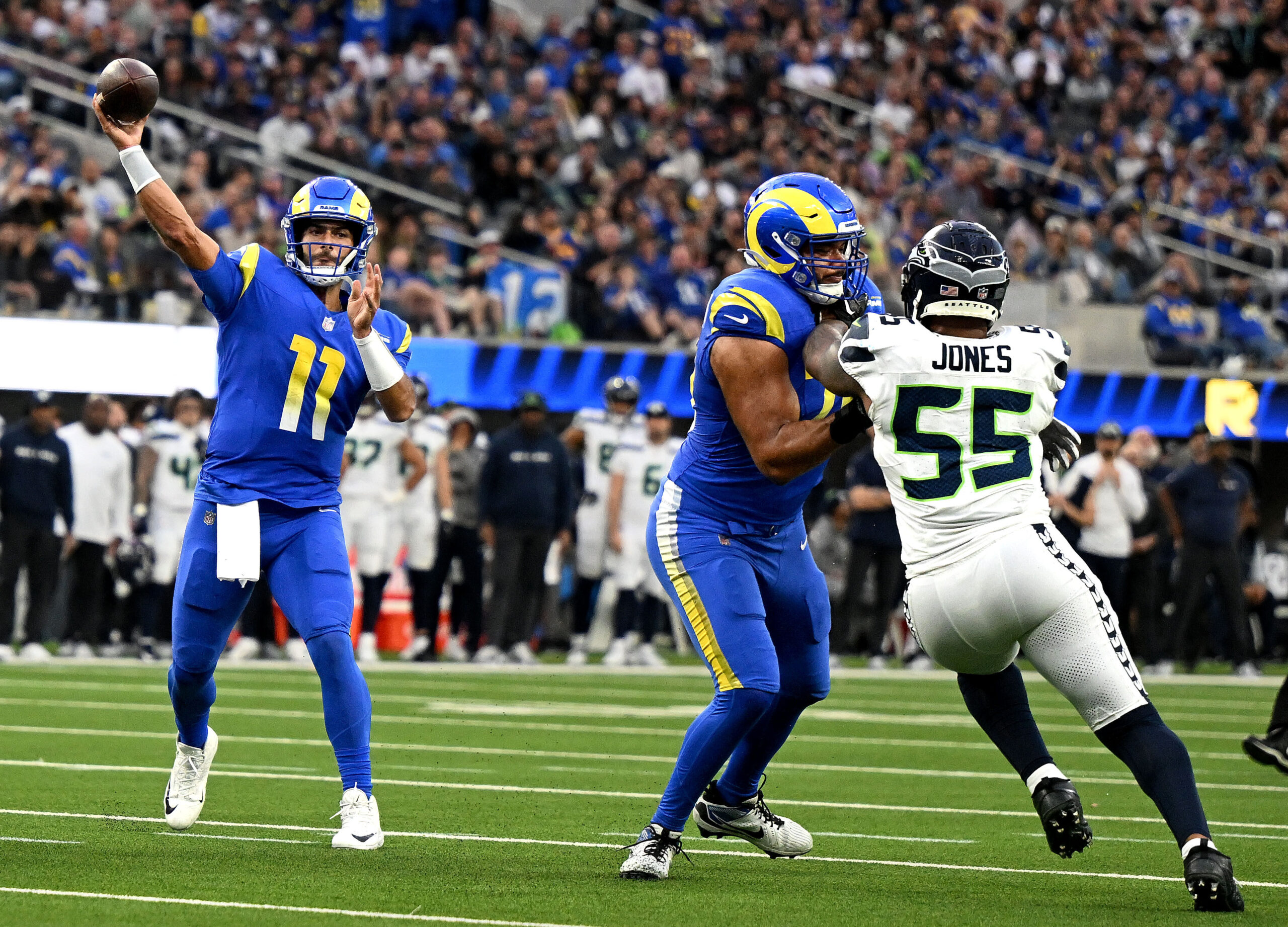 Rams quarterback Jimmy Garoppolo throws up field against the visiting...