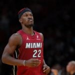 Nov 26, 2024; Miami, Florida, USA; Miami Heat forward Jimmy Butler (22) looks on against the Milwaukee Bucks during the fourth quarter at Kaseya Center.