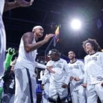 Orlando Magic forward Paolo Banchero in the center of the huddle during player intros