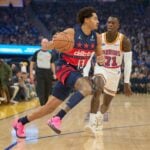 Jan 18, 2025; San Francisco, California, USA; Washington Wizards guard Jordan Poole (13) drives with the ball against Golden State Warriors guard Dennis Schroder (71) during the first quarter at Chase Center. Mandatory Credit: Robert Edwards-Imagn Images