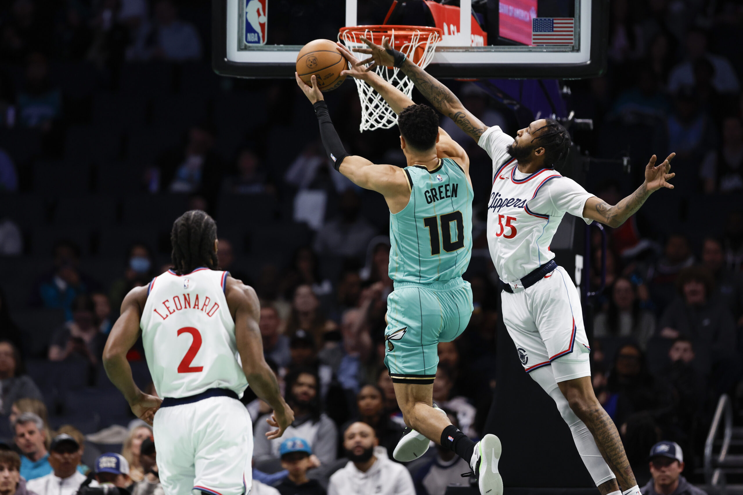 Charlotte Hornets guard Josh Green (10) drives to the basket...