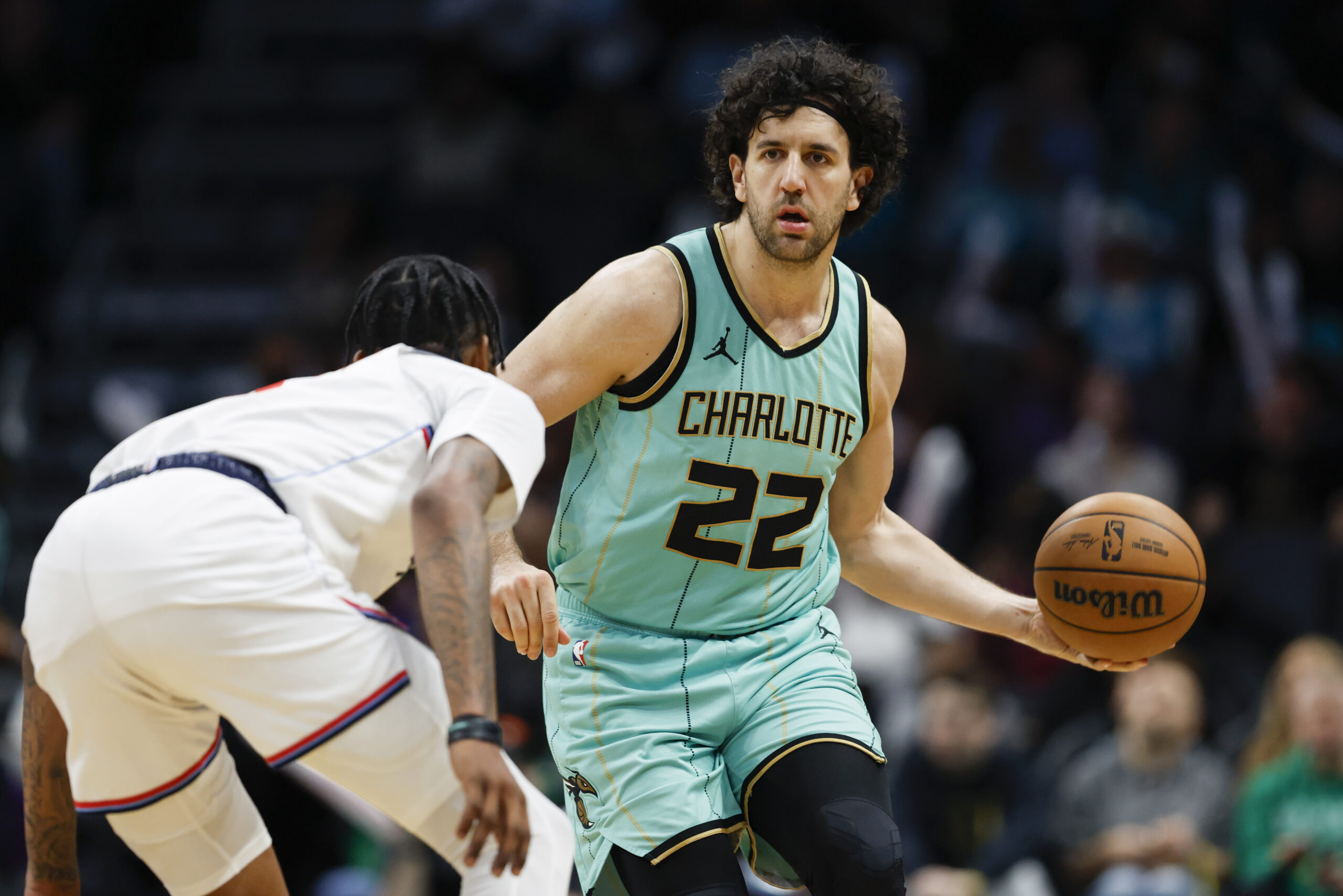 Charlotte Hornets guard Vasa Micic (22) looks to pass the...