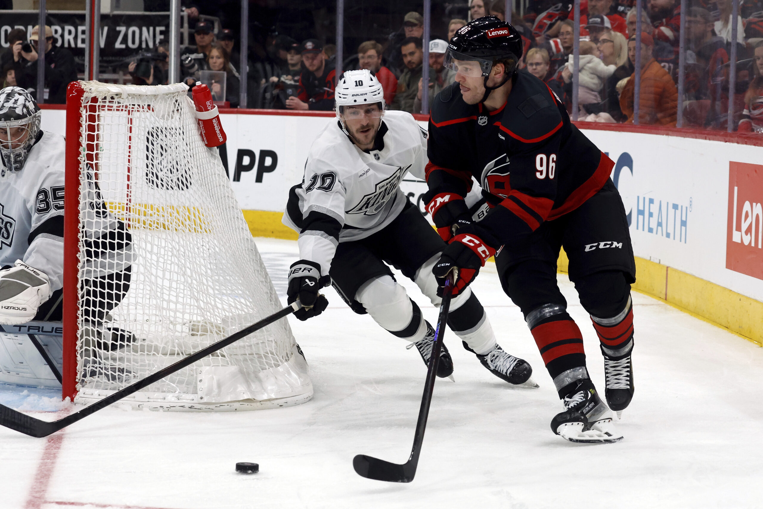 Carolina Hurricanes’ Mikko Rantanen (96) controls the puck in front...