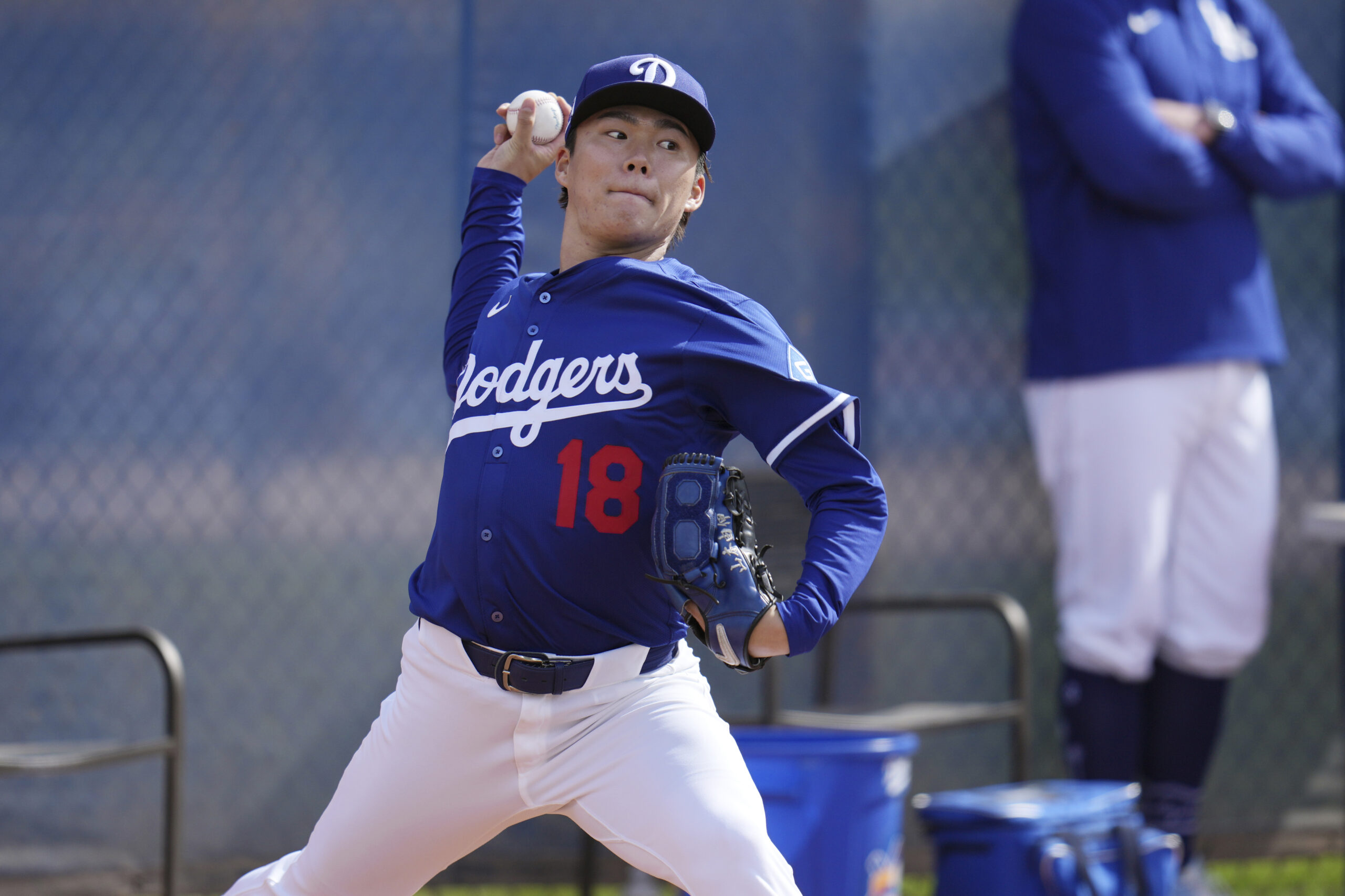 Dodgers pitcher Yoshinobu Yamamoto throws during a pitching session on...