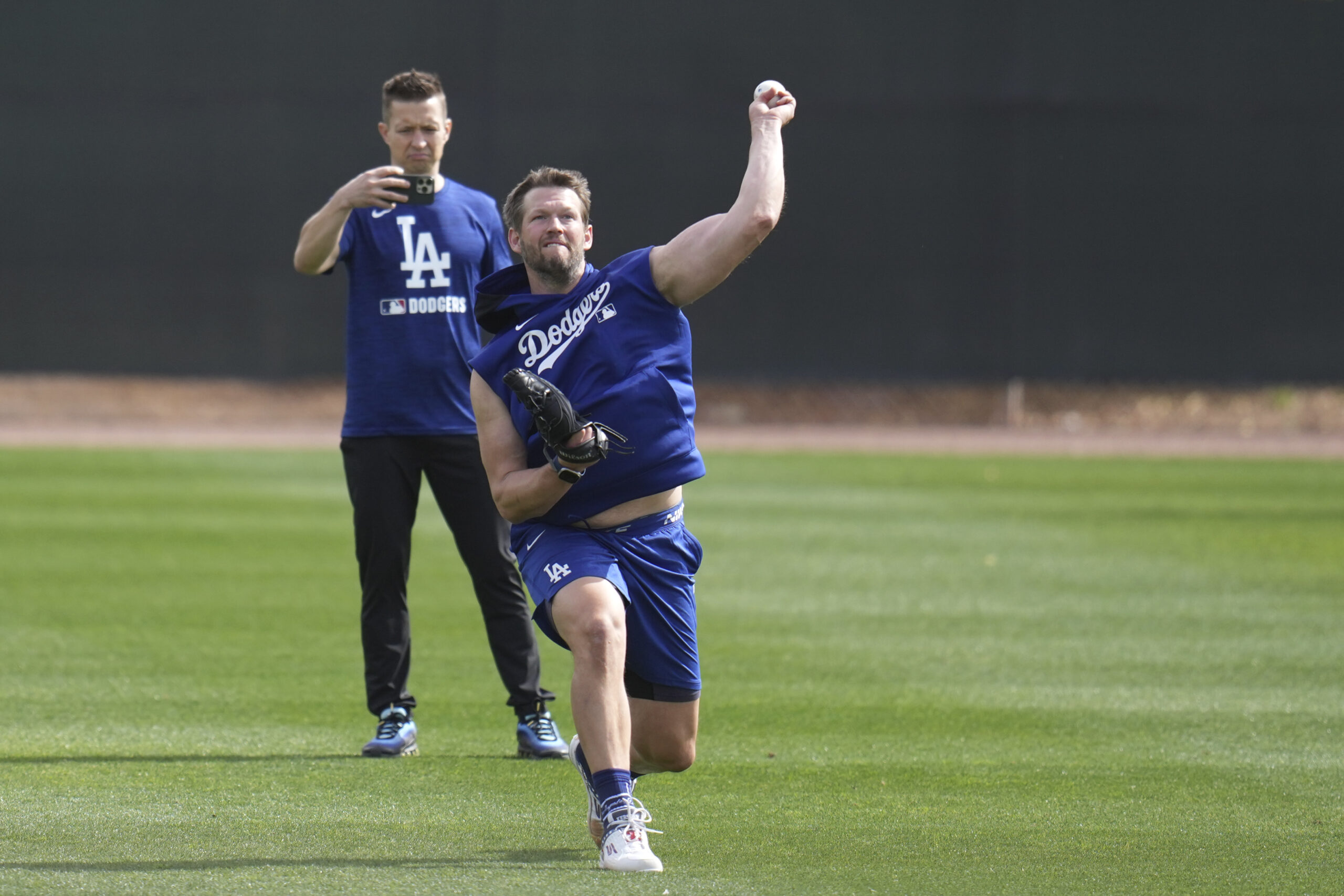 Dodgers pitcher Clayton Kershaw warms up on Tuesday at their...