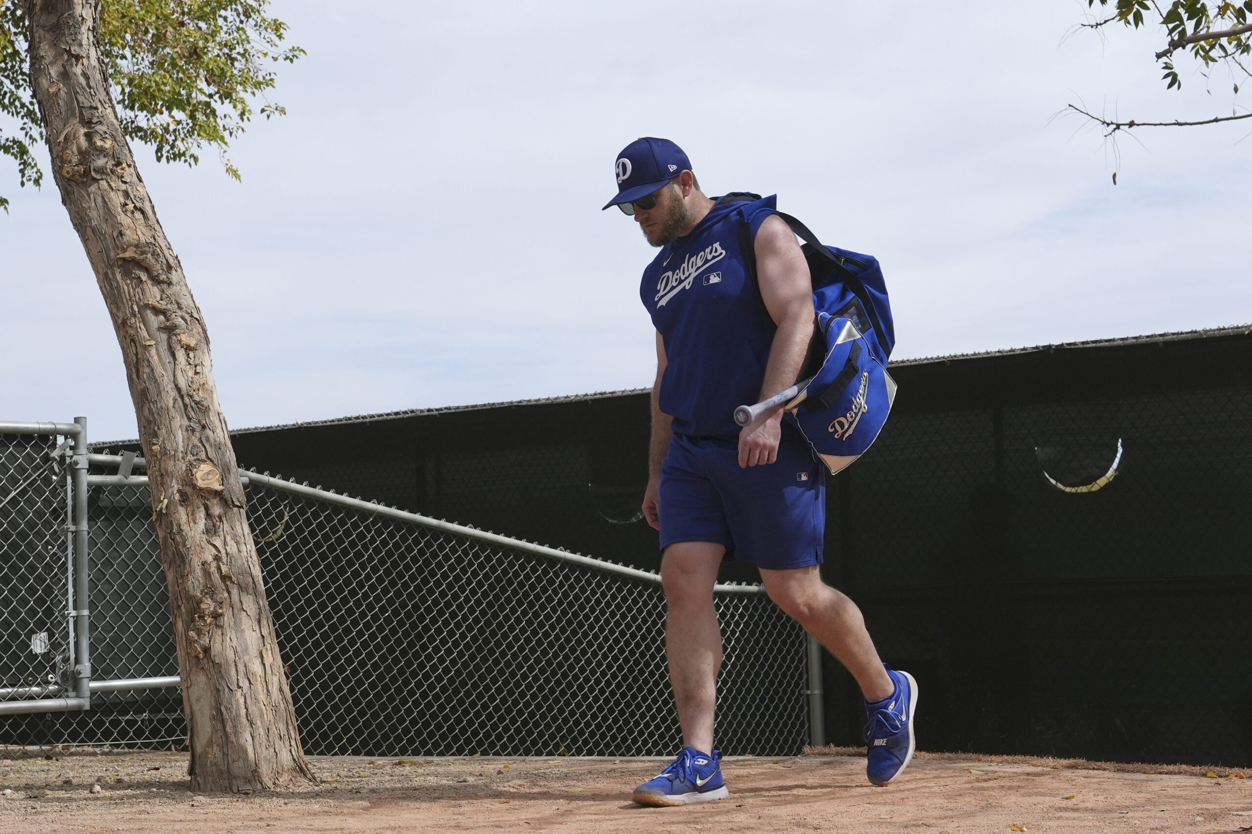 Dodgers third baseman Max Muncy walks back to the clubhouse...