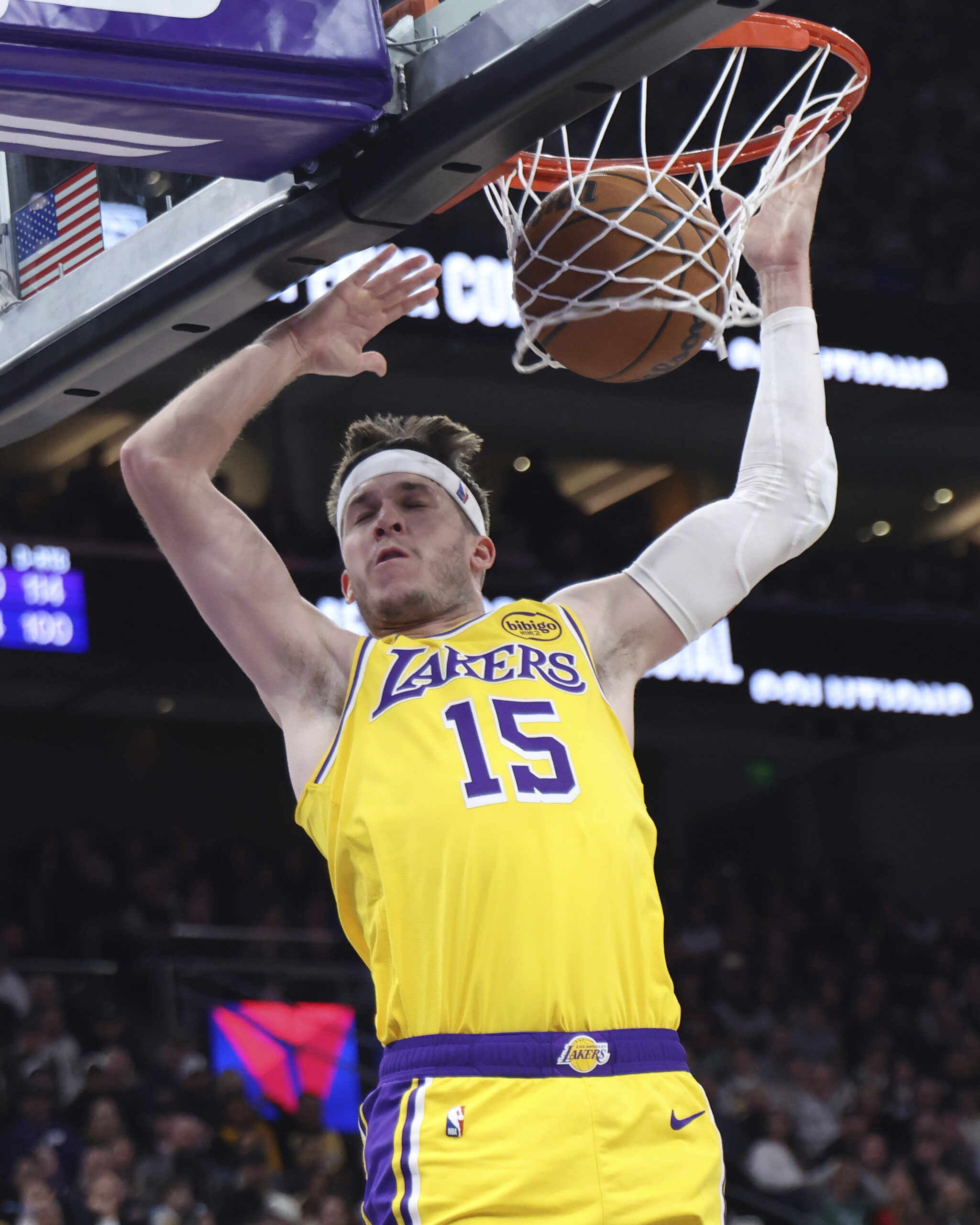 Lakers guard Austin Reaves dunks against the Utah Jazz during...