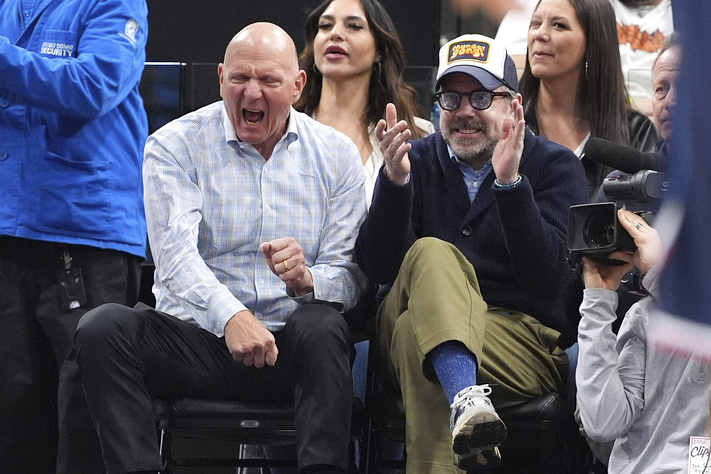 Clippers owner Steve Ballmer, left, and actor Jason Sudeikis celebrate...