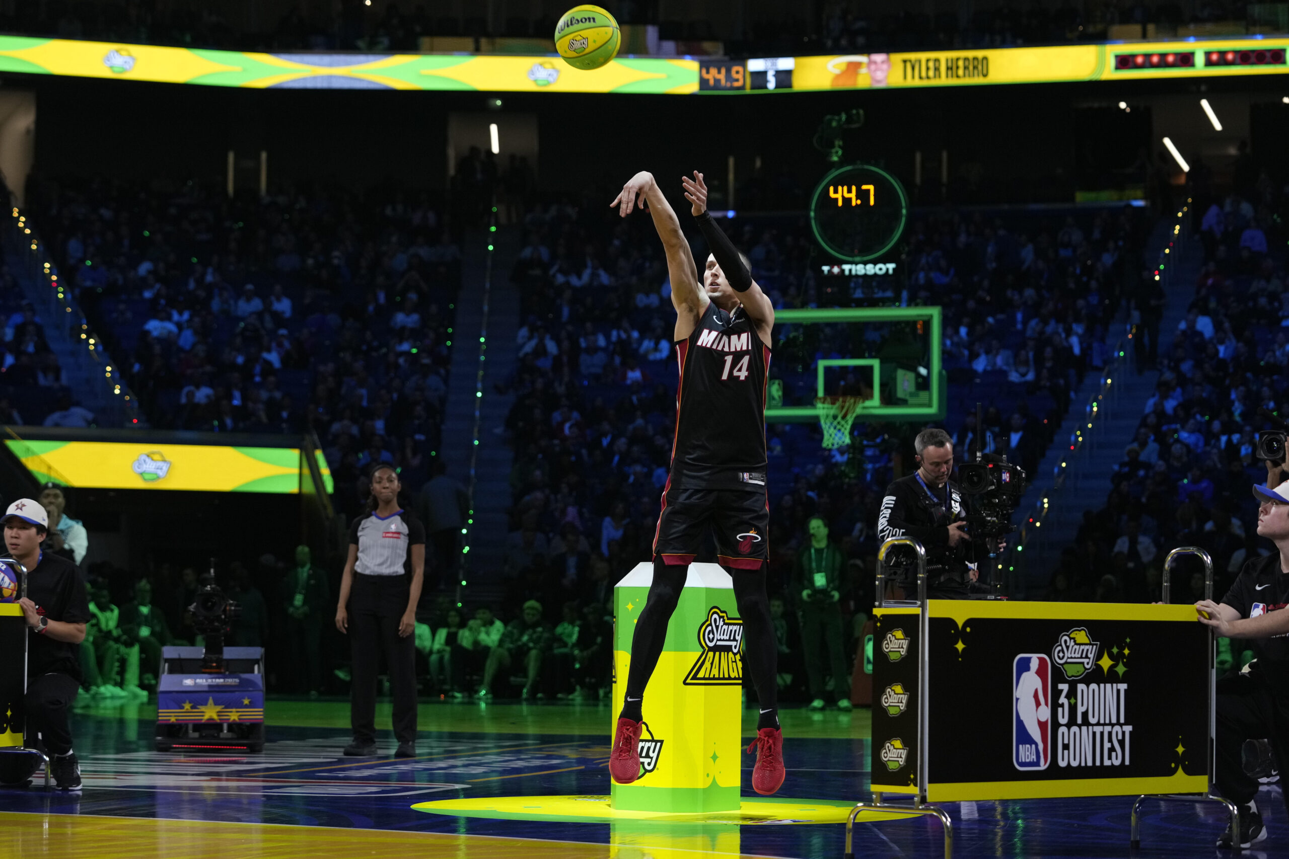 Miami Heat guard Tyler Herro shoots during the 3-point contest...