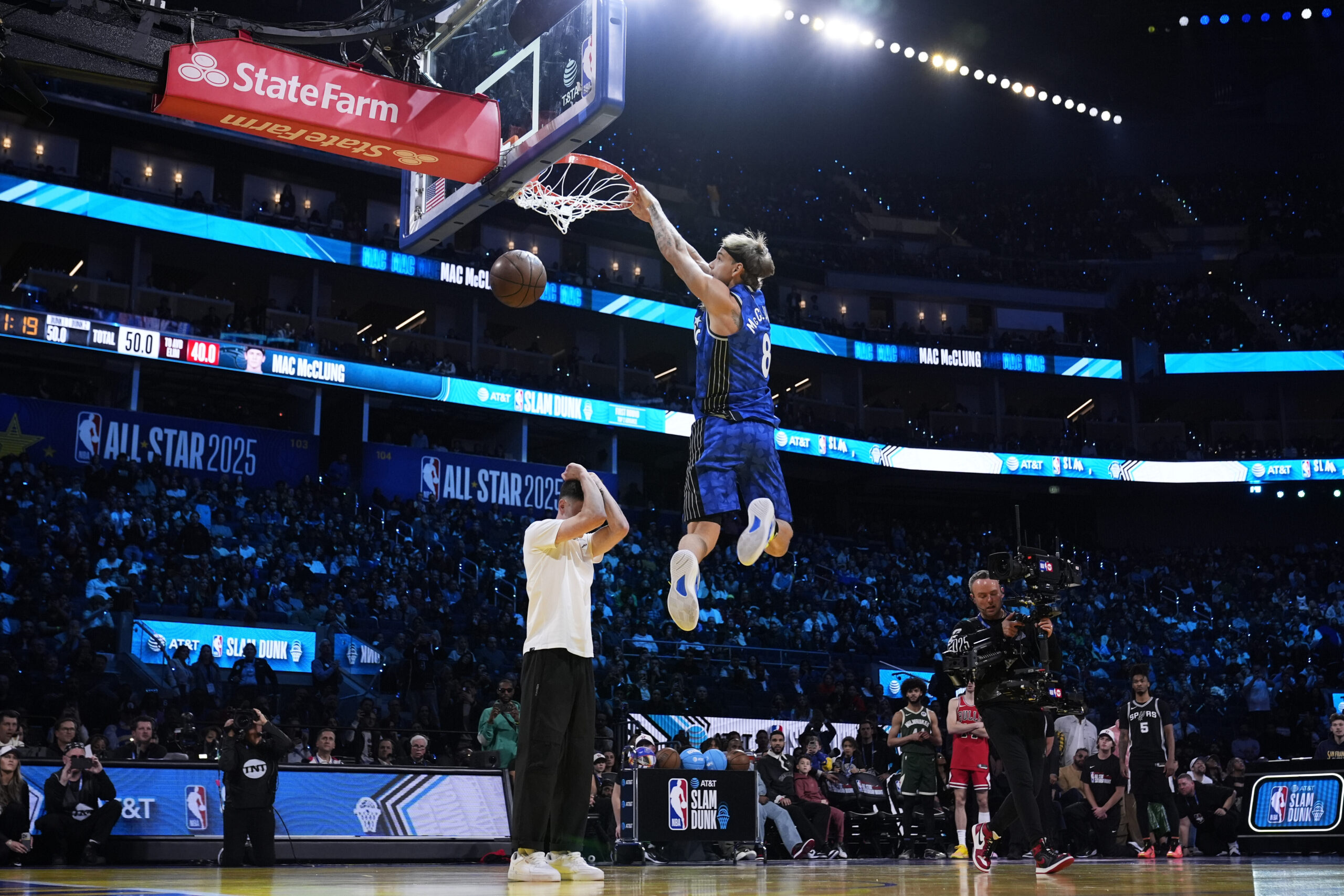 Osceola Magic guard Mac McClung dunks during the slam dunk...