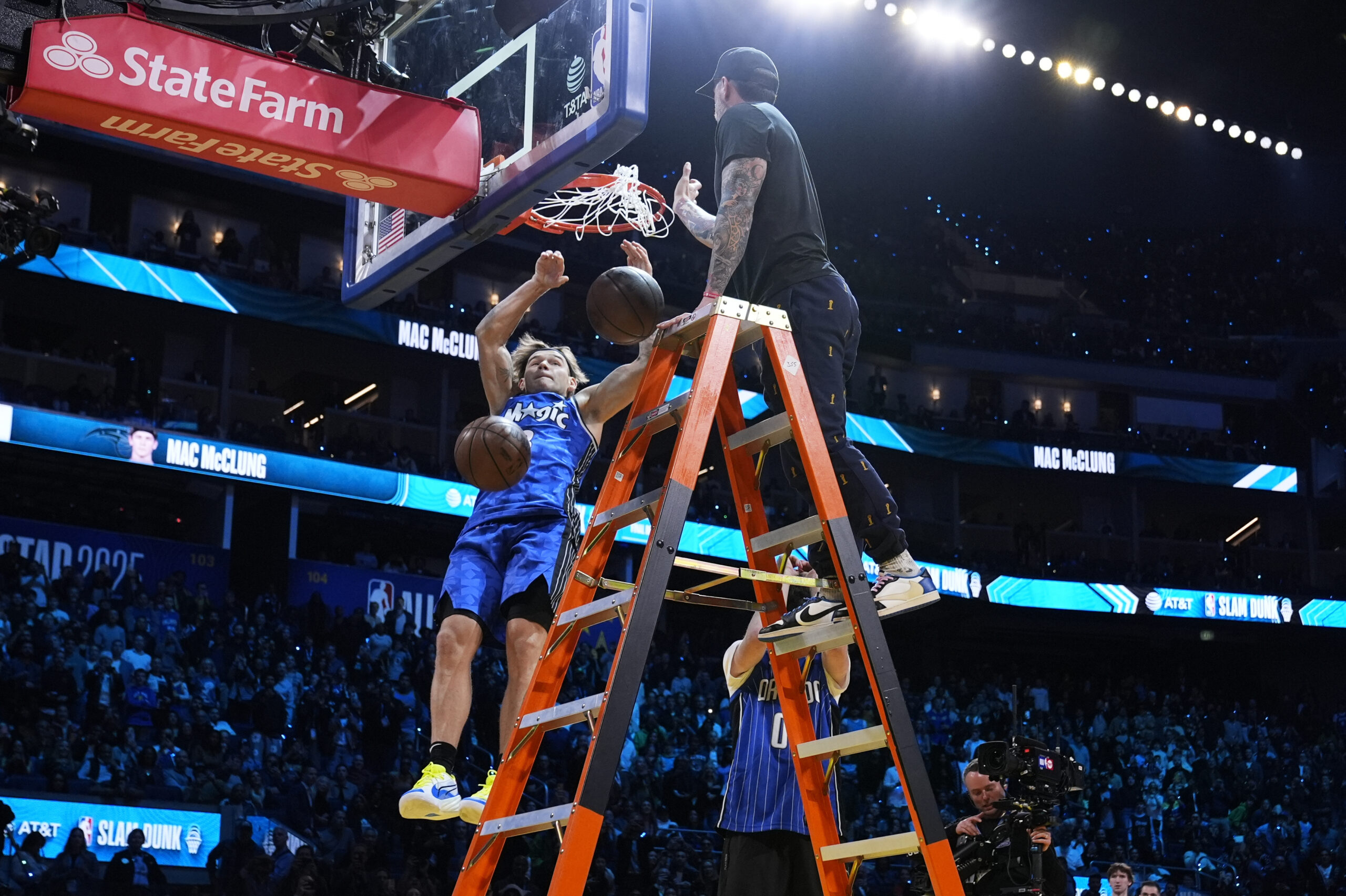 Osceola Magic guard Mac McClung dunks during the slam dunk...