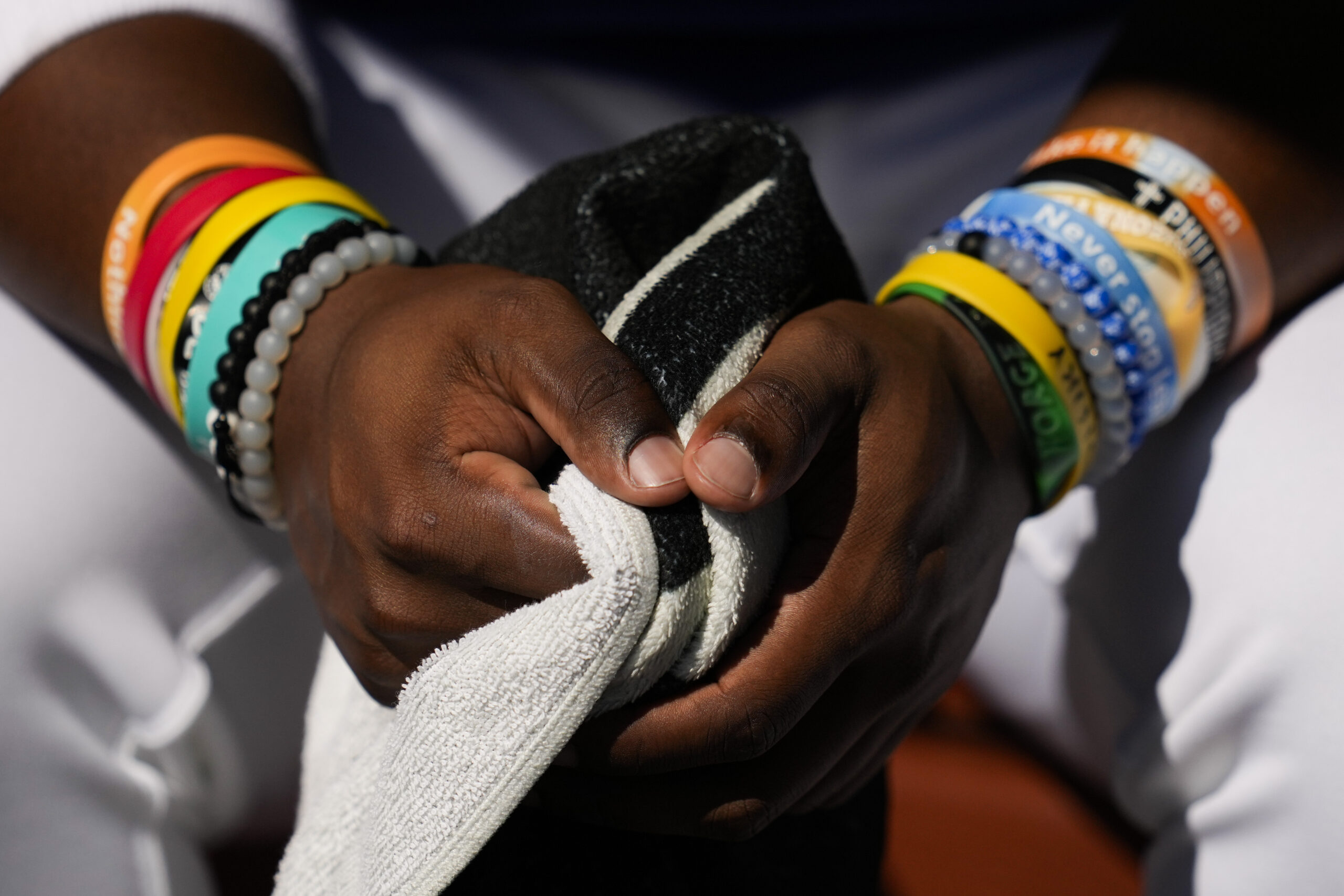 Dodgers outfielder Zyhir Hope sits in the dugout during a...