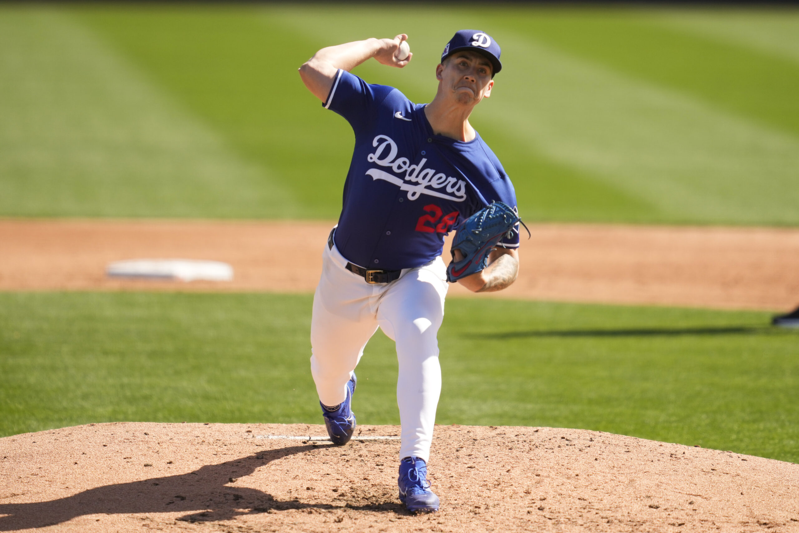 Dodgers pitcher Bobby Miller throws during the third inning of...