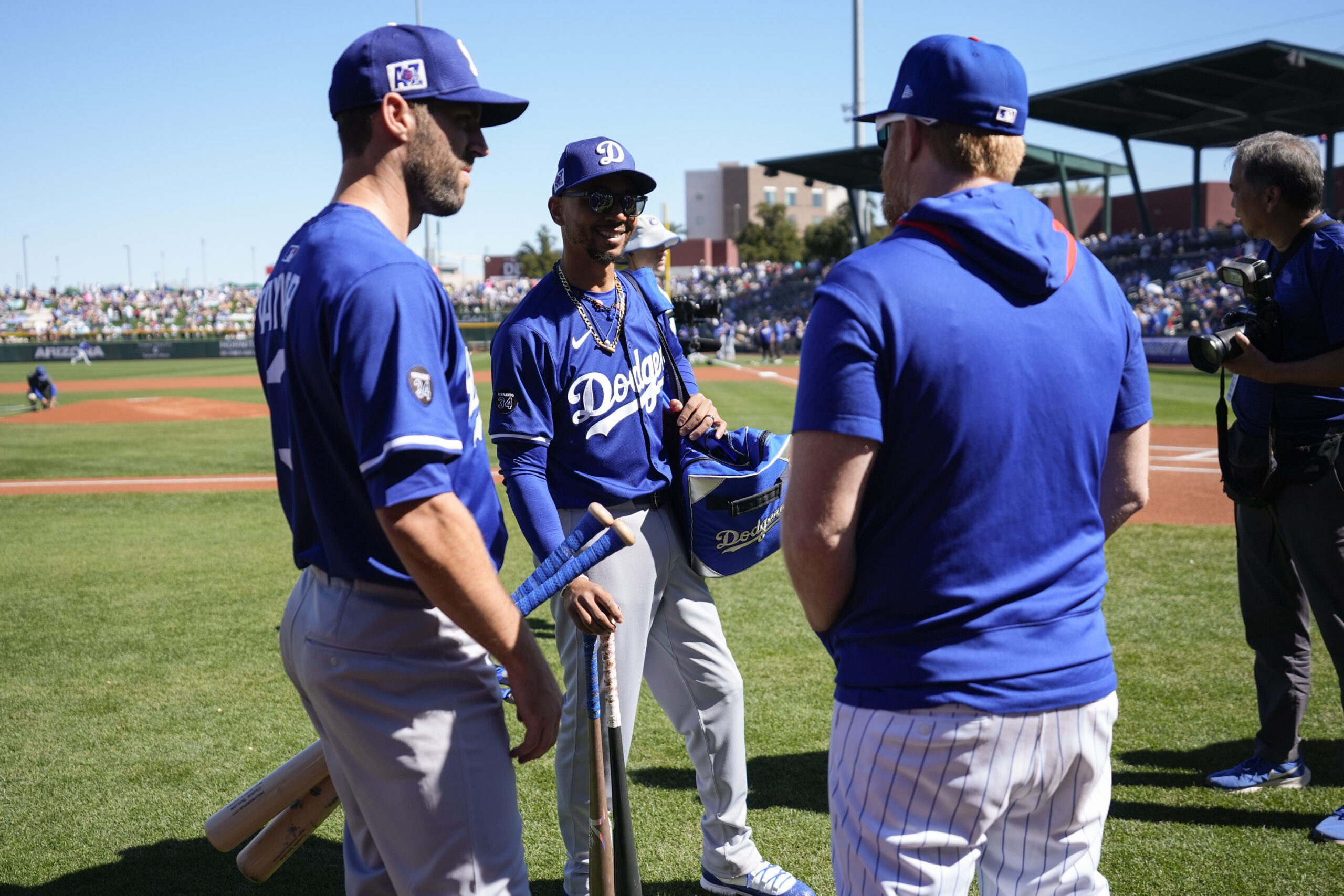 Dodgers designated hitter Chris Taylor, left, and shortstop Mookie Betts,...