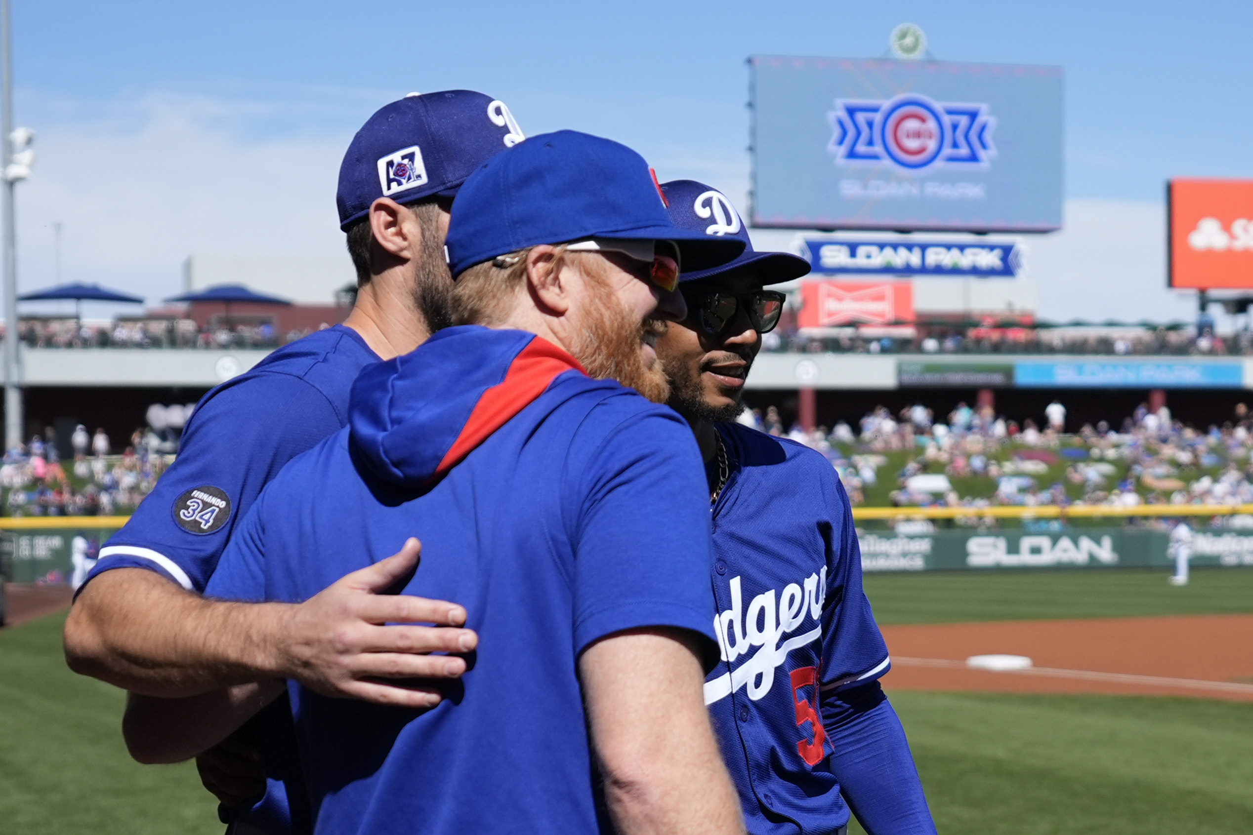 Dodgers designated hitter Chris Taylor, left, and shortstop Mookie Betts,...