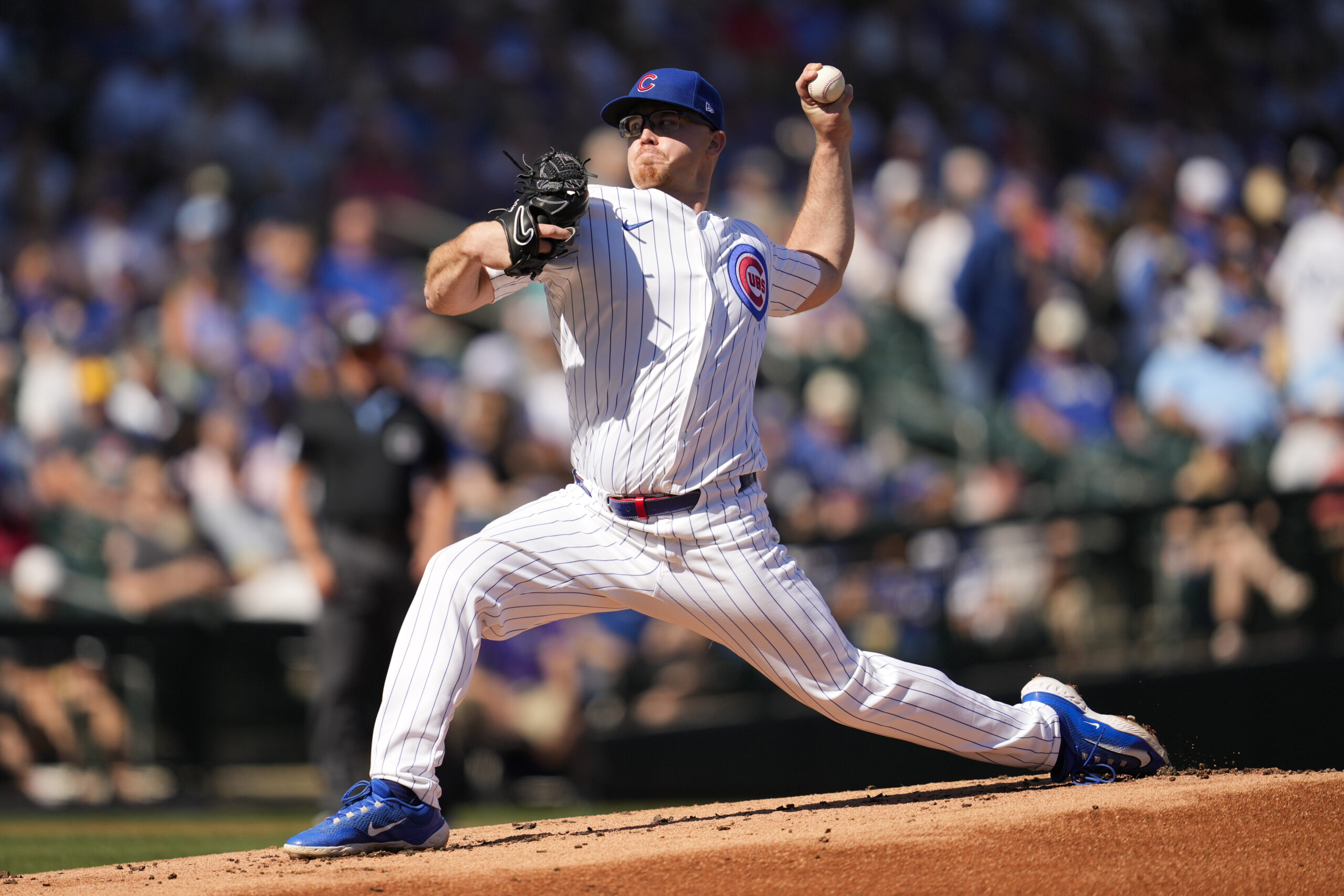 Chicago Cubs starting pitcher Jordan Wicks throws during the first...