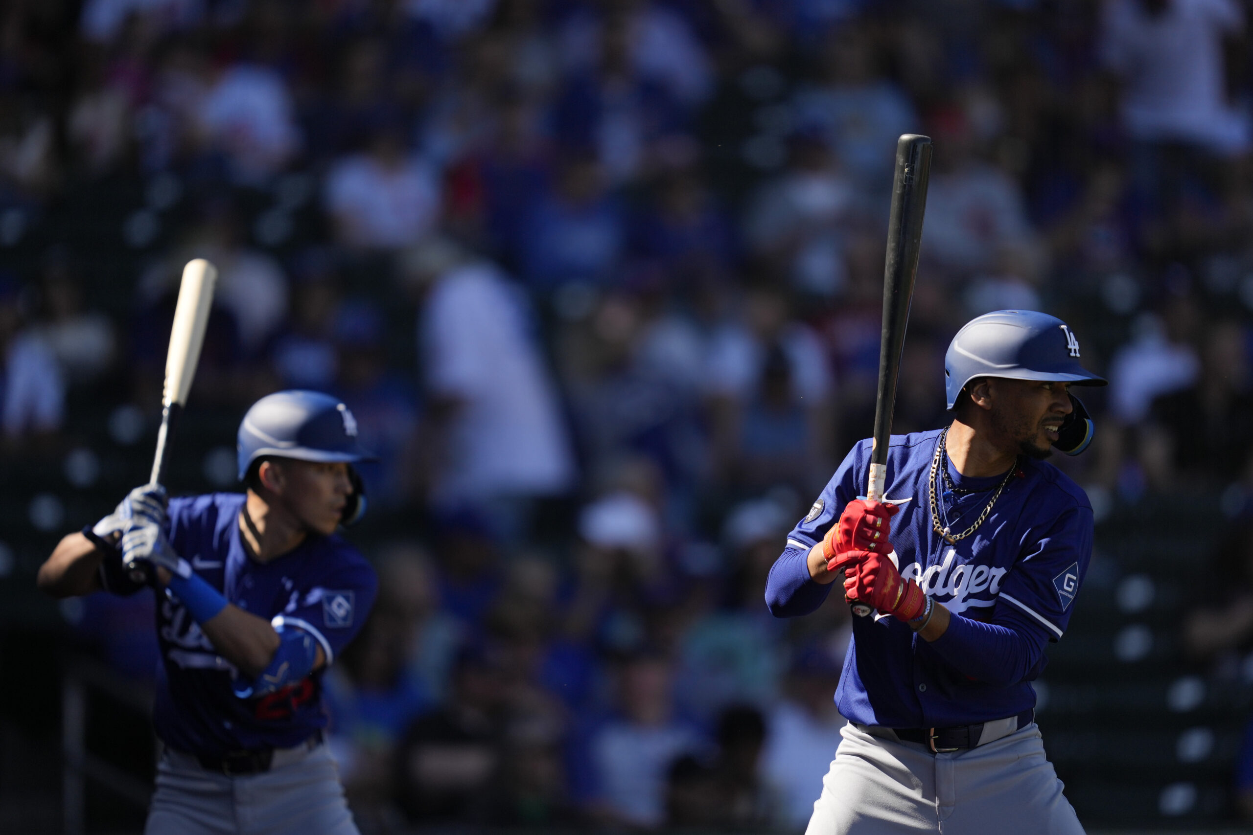 The Dodgers’ Tommy Edman, left, and Mookie Betts prepare to...