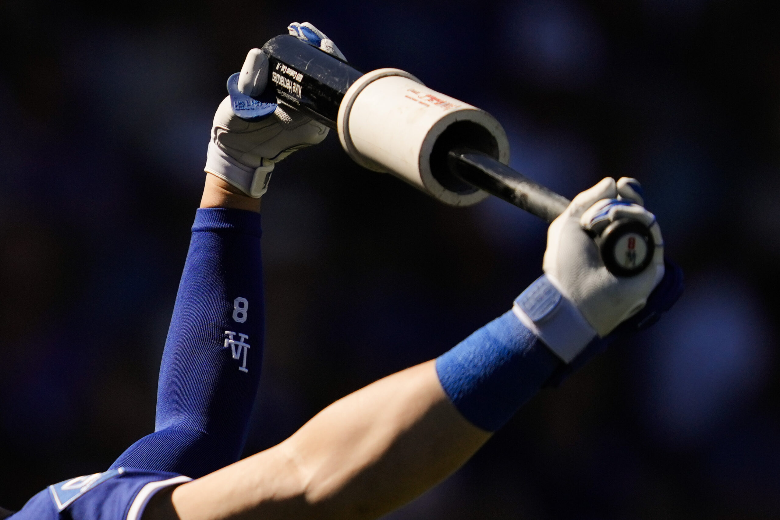 The Dodgers’ Kiké Hernández stretches during the second inning of...