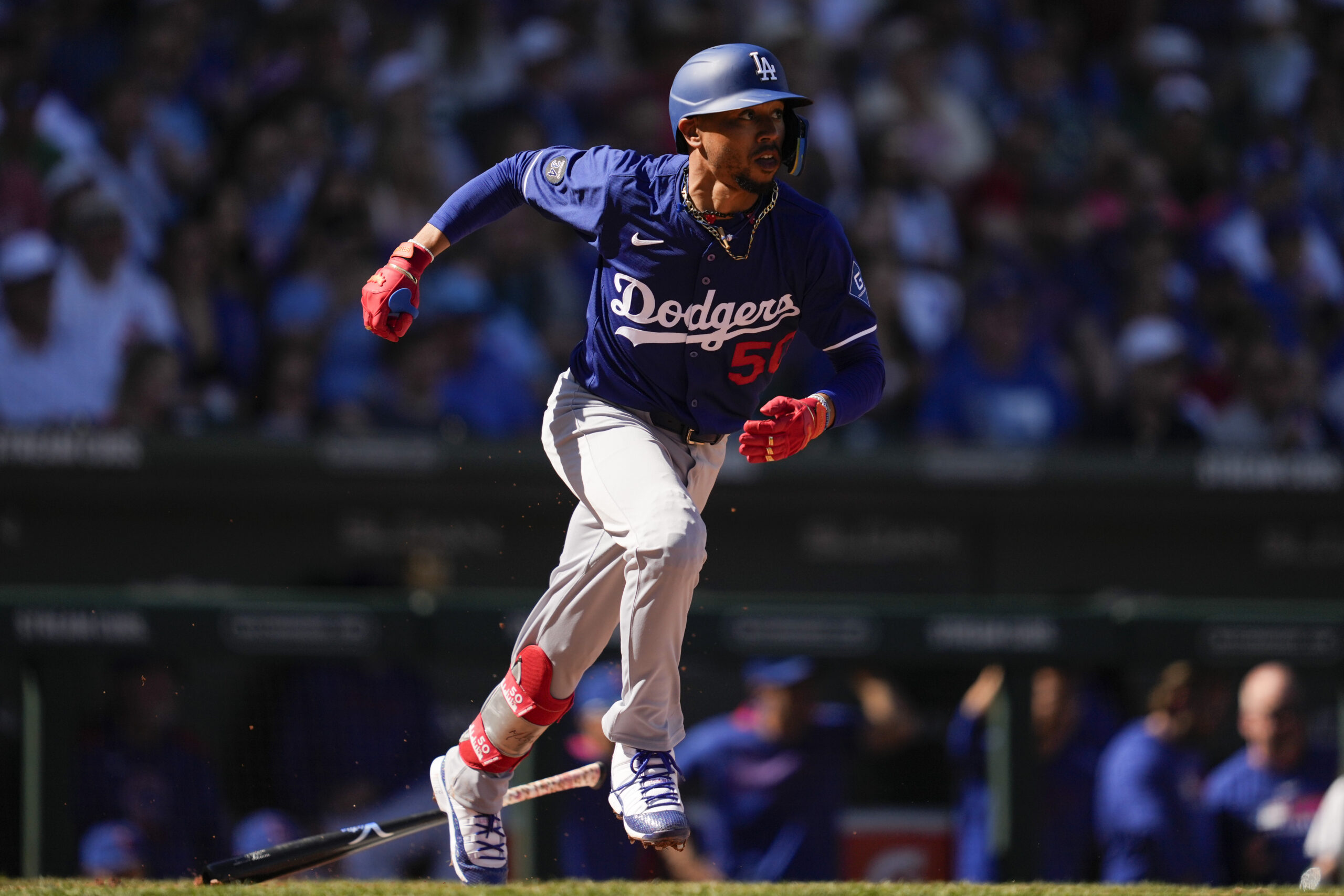 The Dodgers’ Mookie Betts singles during the third inning of...