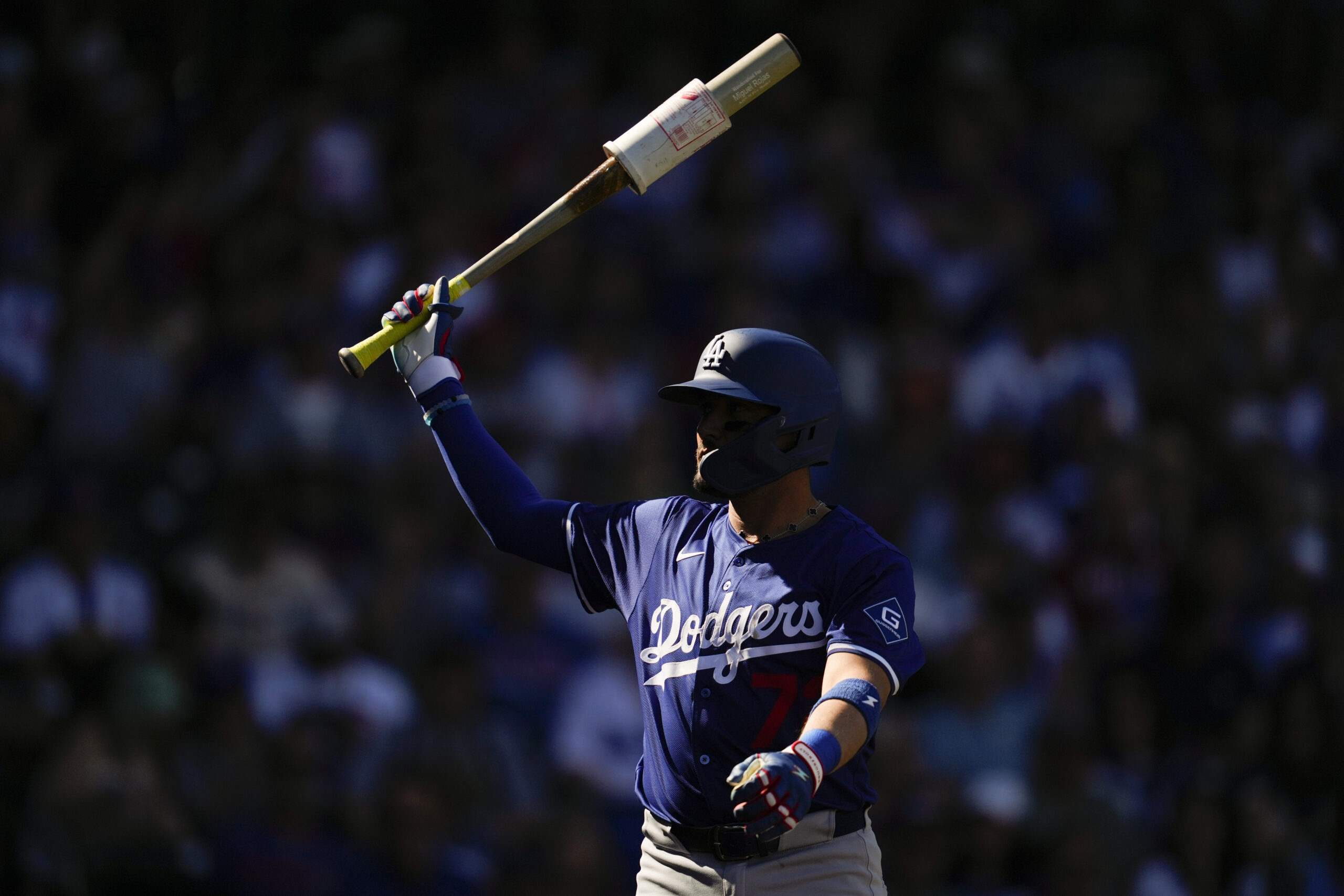 The Dodgers’ Miguel Rojas prepares to bat during the third...