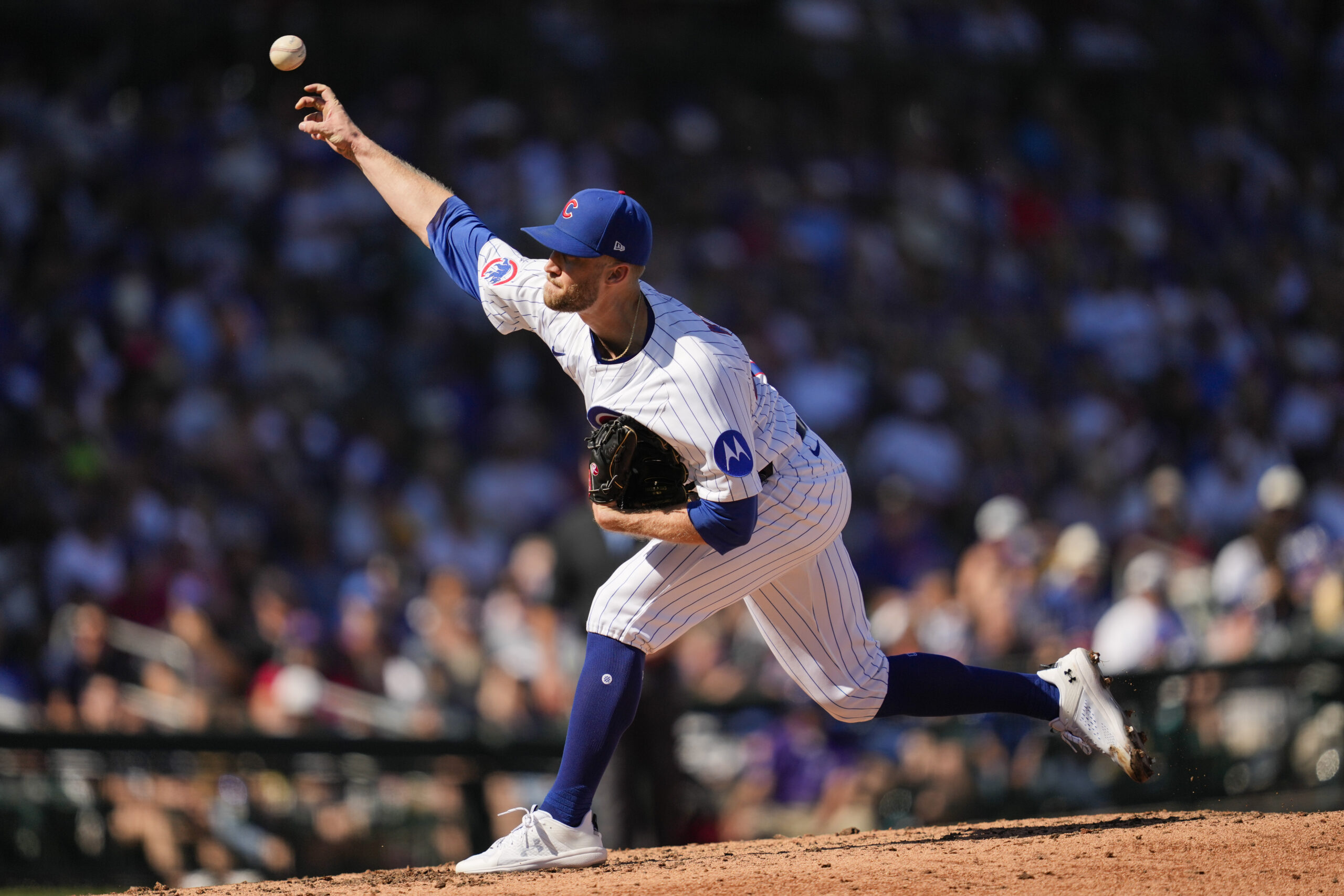 Chicago Cubs pitcher Caleb Kilian throws to the plate during...