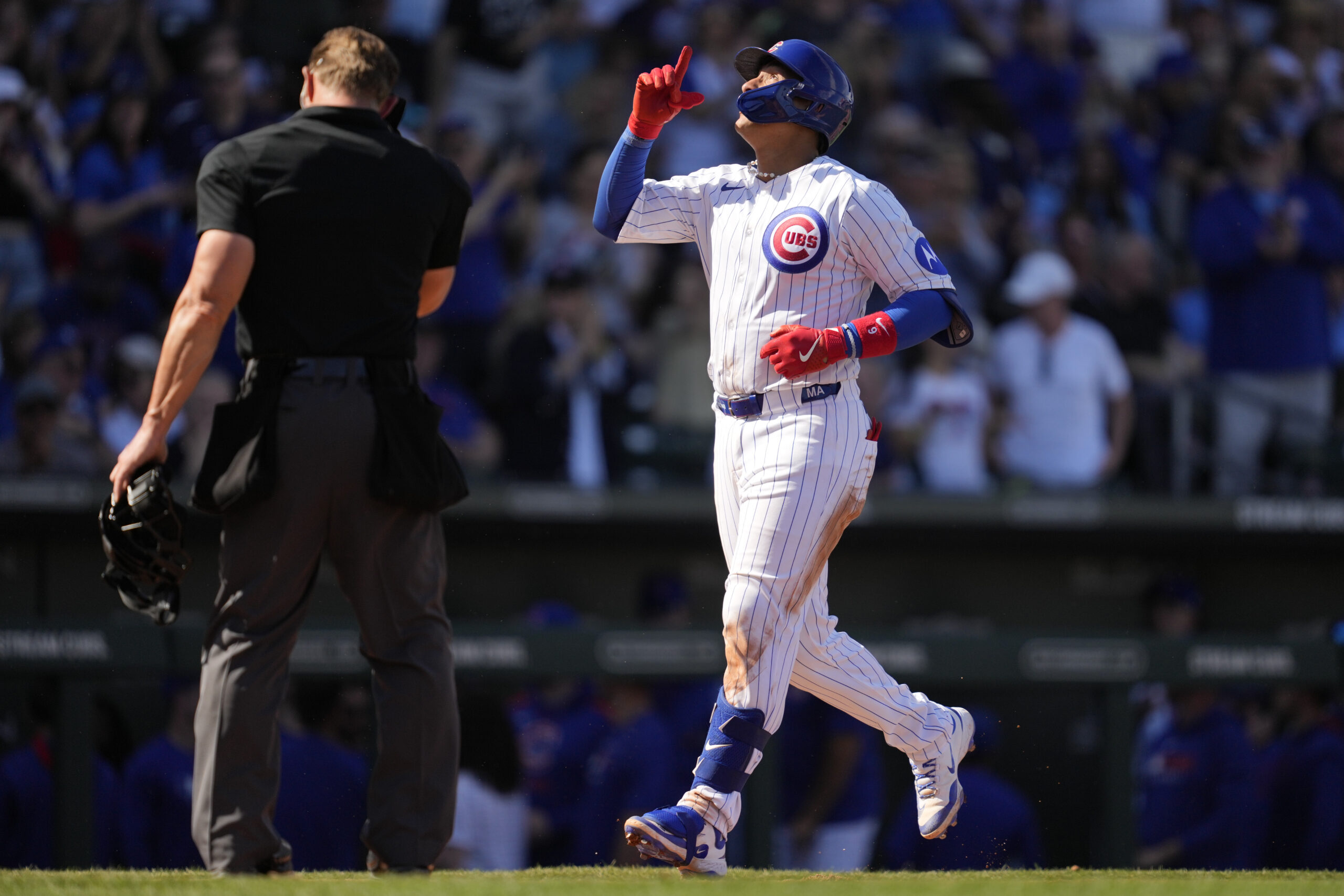 The Chicago Cubs’ Miguel Amaya celebrates after hitting a home...