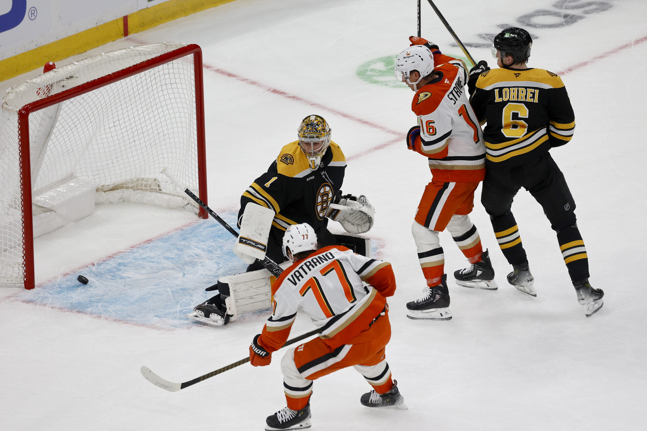 Ducks right wing Frank Vatrano (77) scores past Boston Bruins...