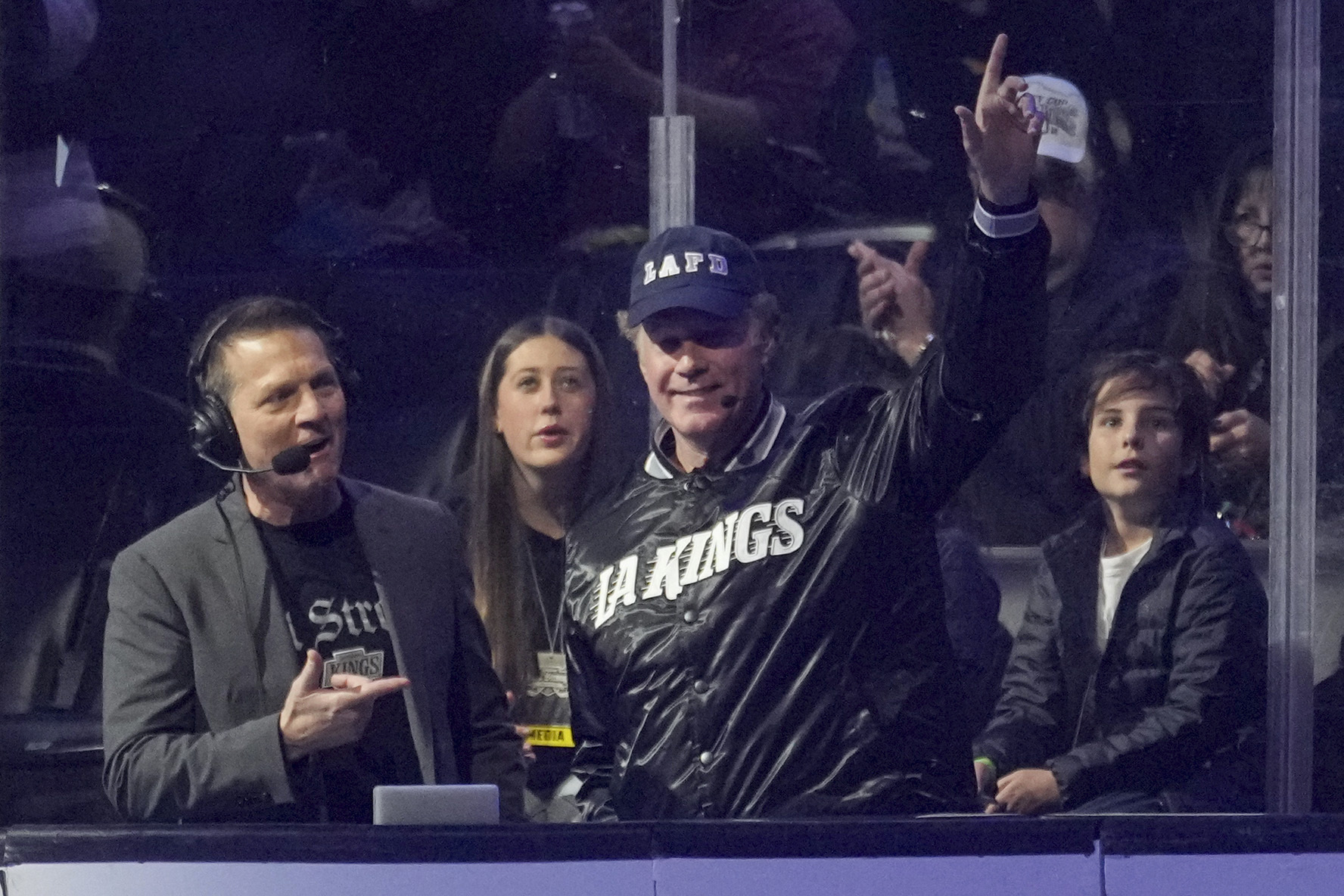 Team Black coach Will Farrell gestures during the Skate for...